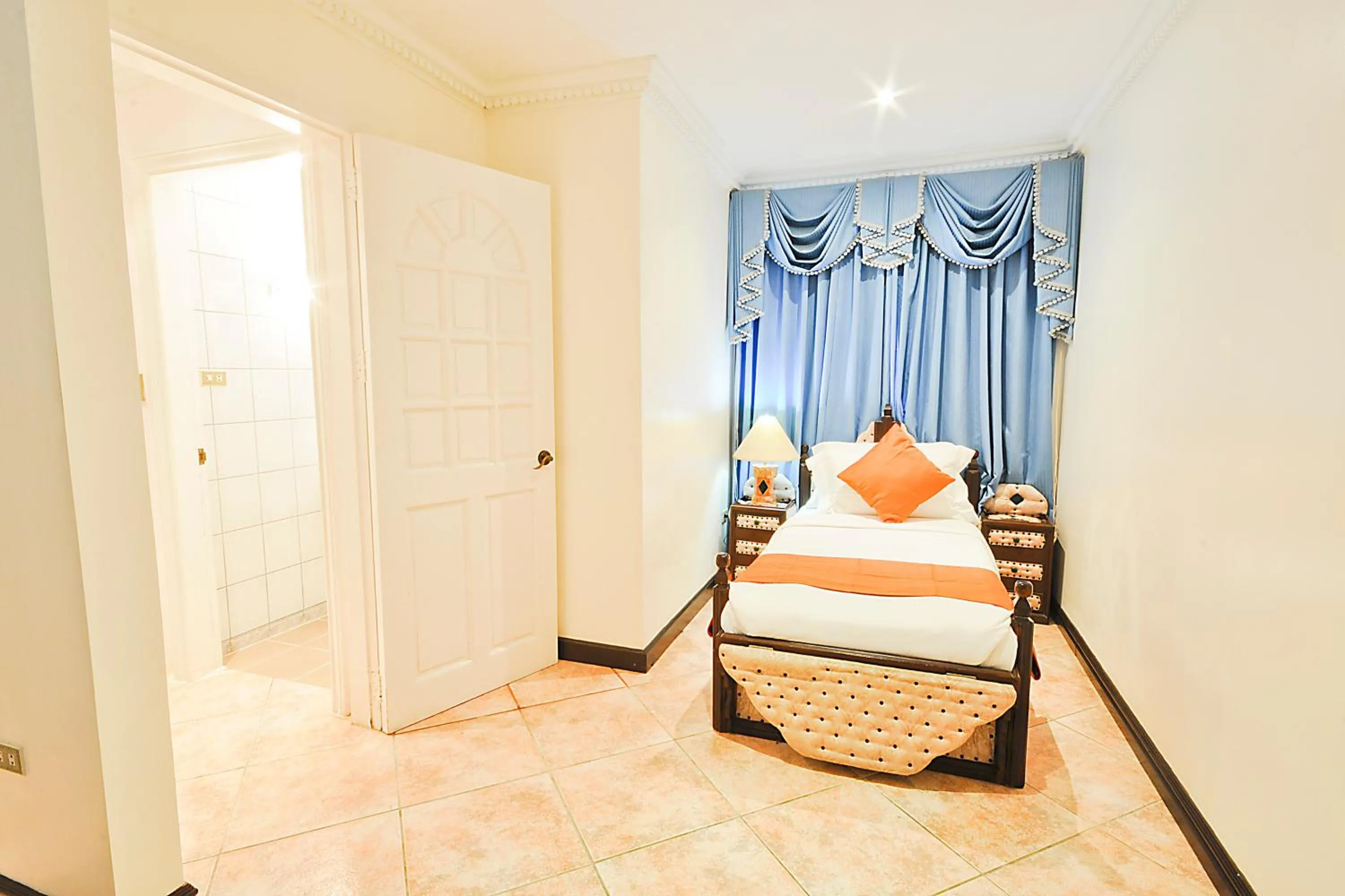 Photo of the whole room, Bed in Paradise Garden Hotel and Convention Center Boracay Powered by ASTON