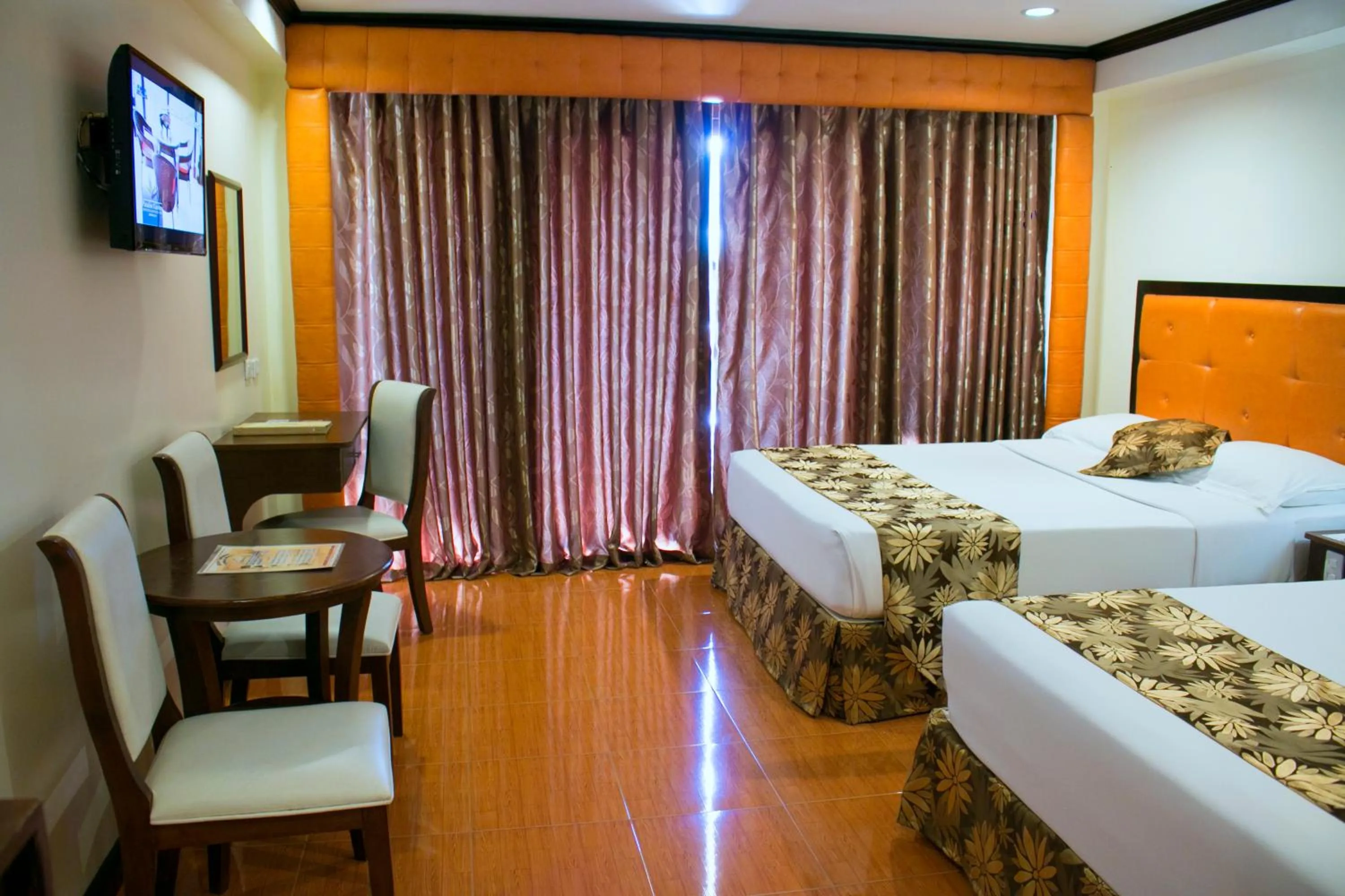 Photo of the whole room, Bed in Paradise Garden Hotel and Convention Center Boracay Powered by ASTON