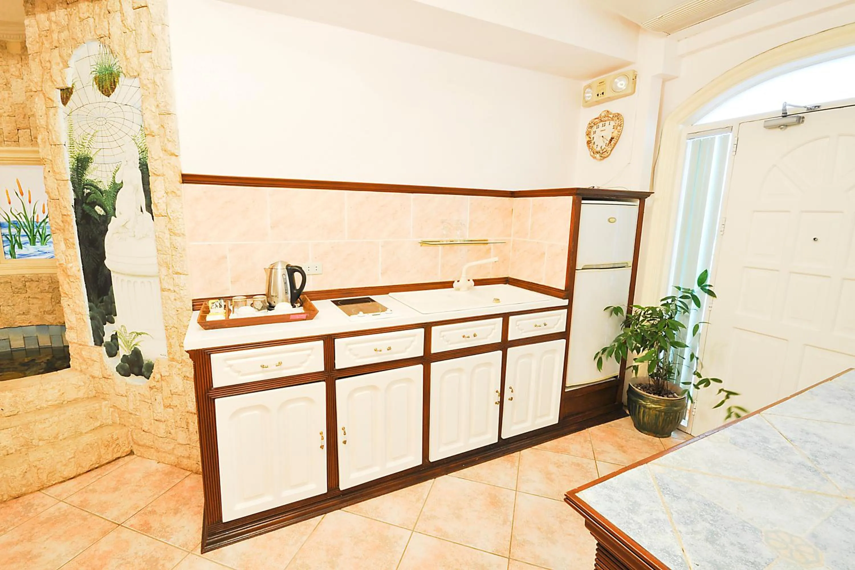 Kitchen or kitchenette, Bed in Paradise Garden Hotel and Convention Center Boracay Powered by ASTON