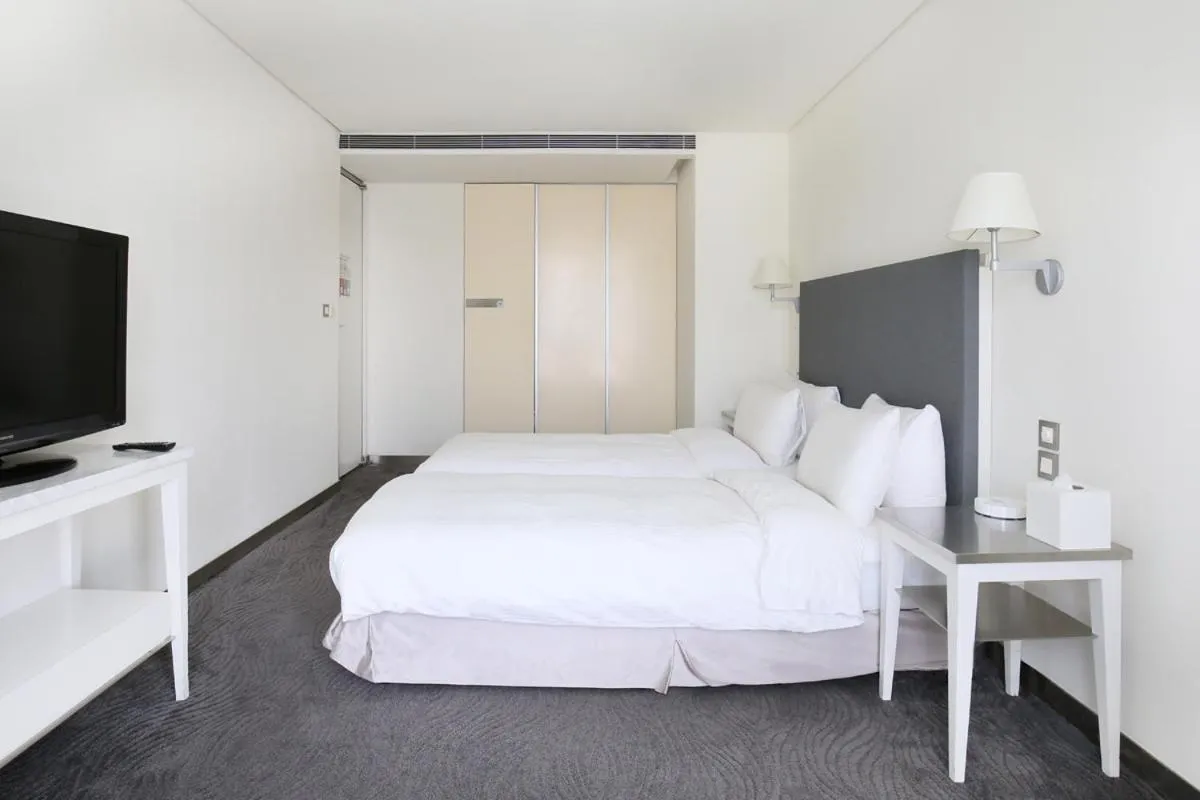 Photo of the whole room, Bed in Ambience Hotel Taipei