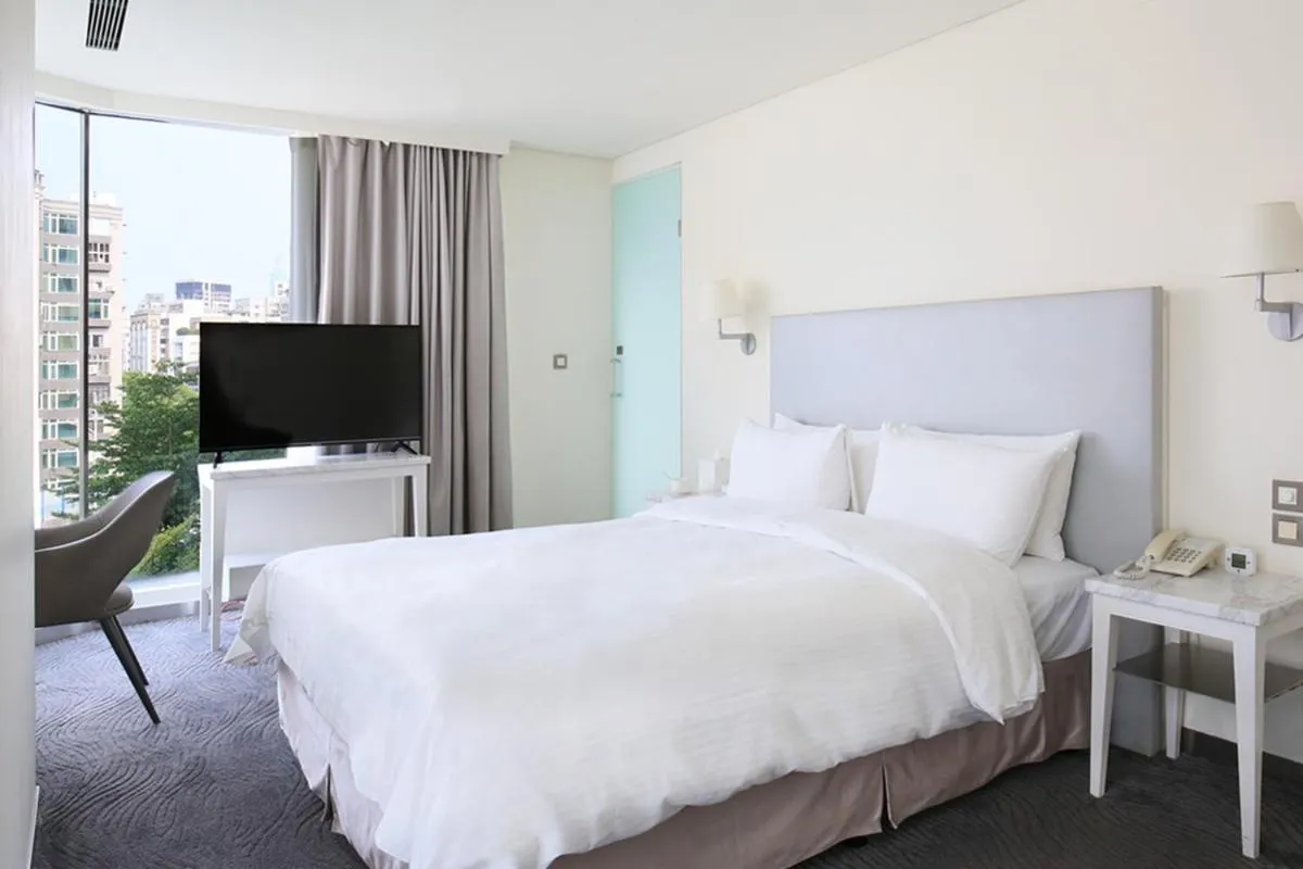 Bed in Ambience Hotel Taipei