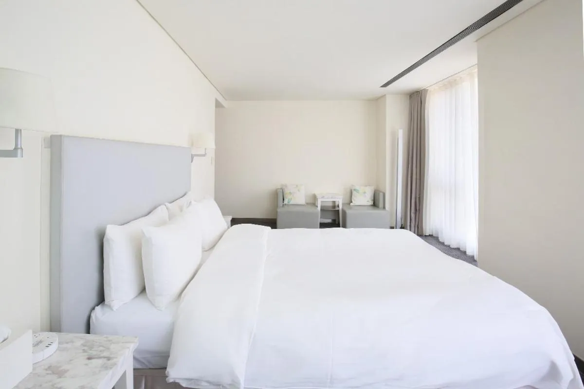 Bed in Ambience Hotel Taipei