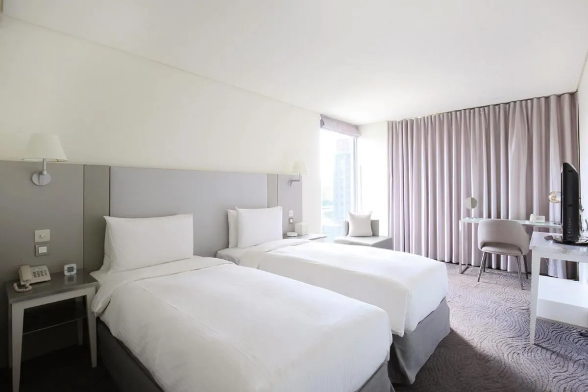 Bed in Ambience Hotel Taipei