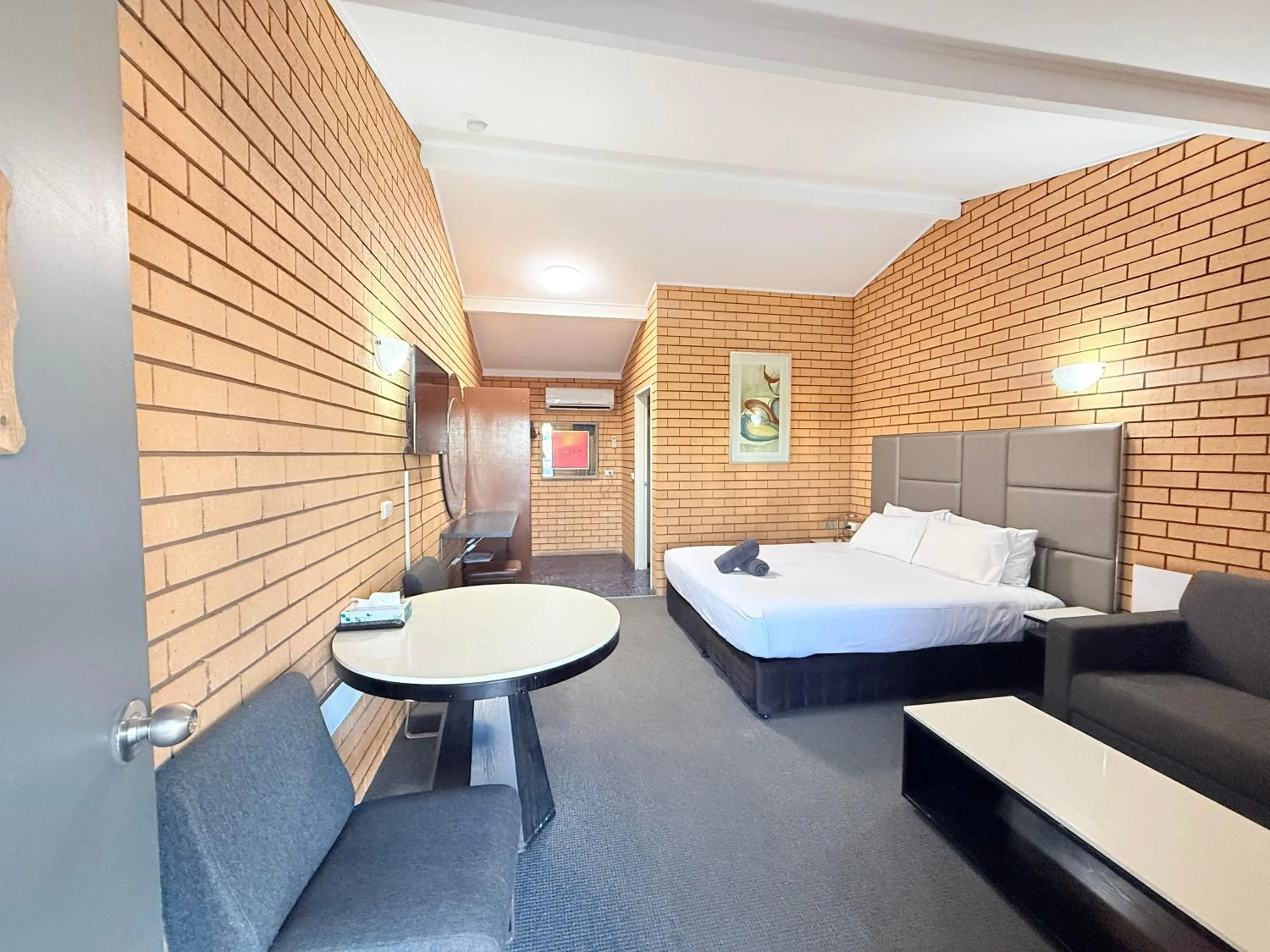 Bed in Stockman Motor Inn