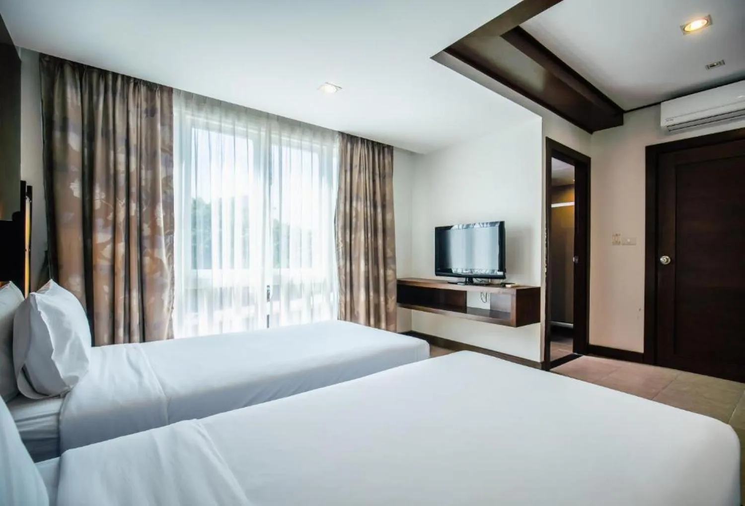 Bed in Ratana Hotel Chalong