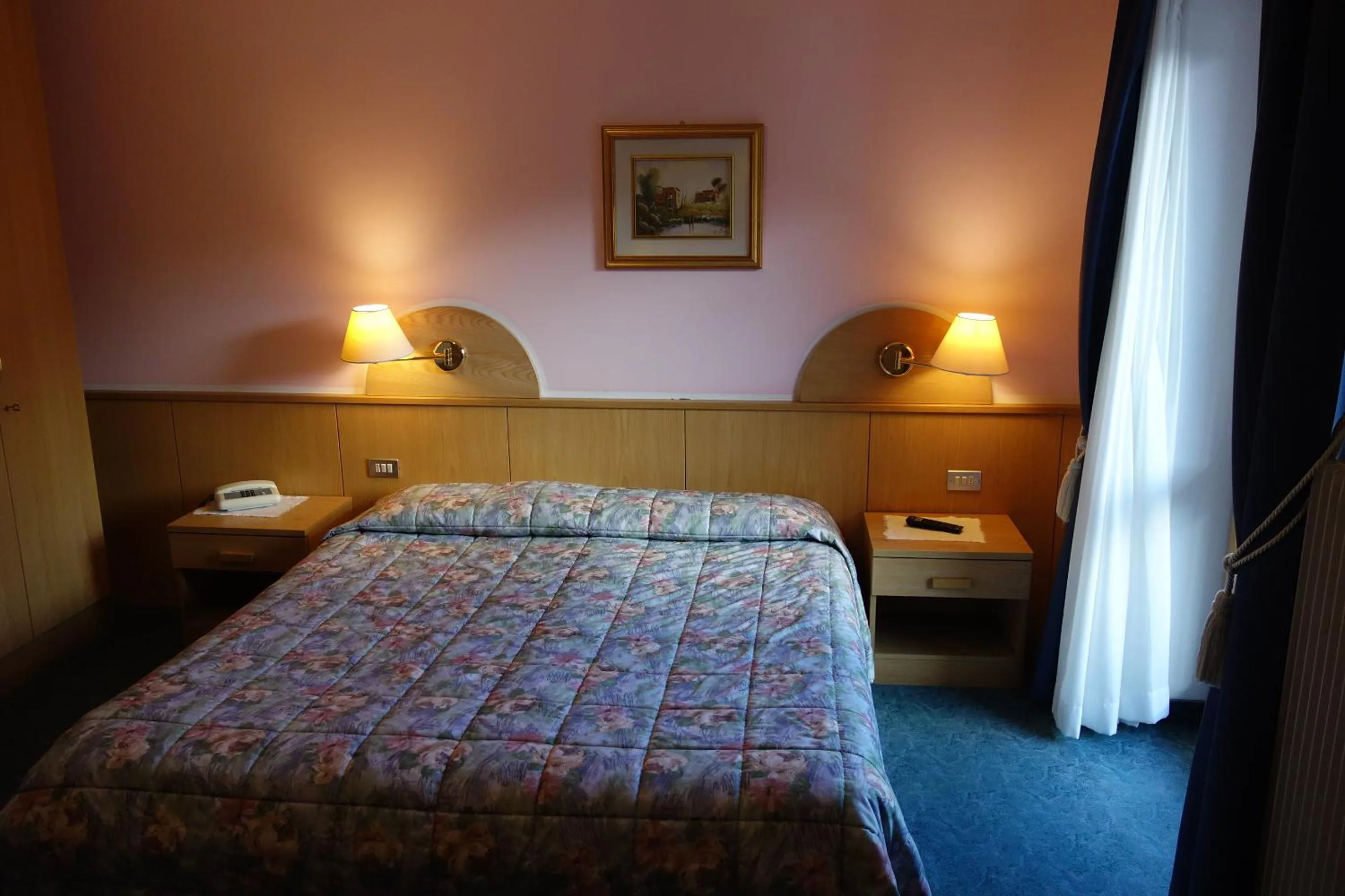 Bed in Alpine Touring Hotel-petfriendly