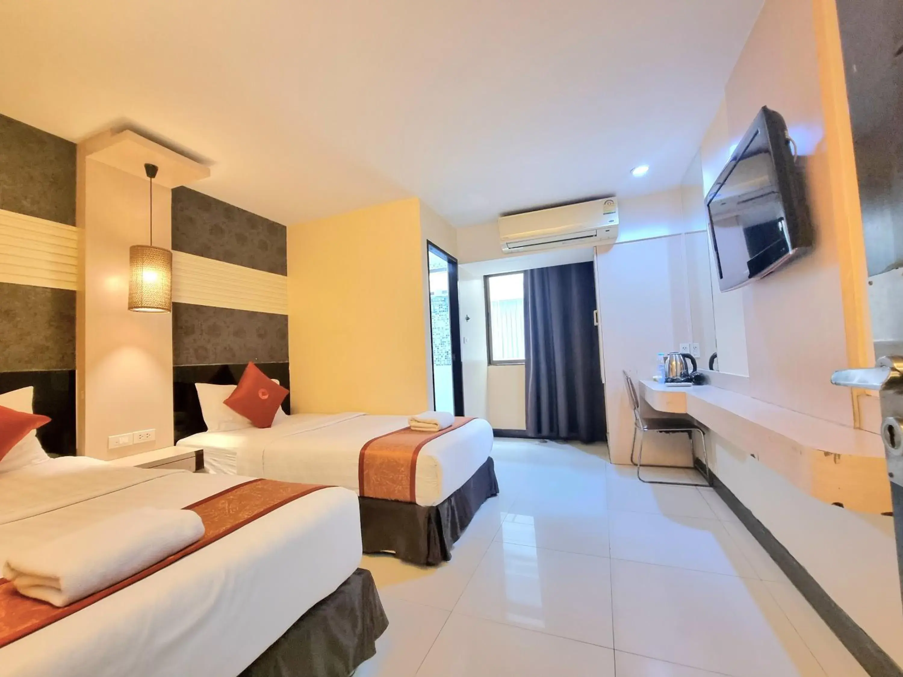 Bed in Cozi Inn Hotel, Bangkok Bed in Cozi Inn Hotel, Bangkok