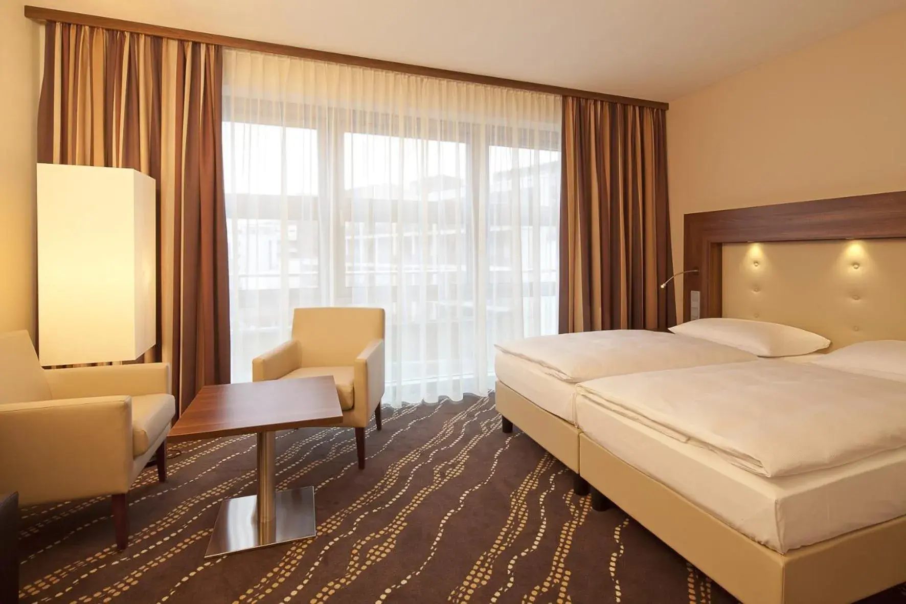 Photo of the whole room, Bed in Heikotel - Hotel Am Stadtpark Photo of the whole room, Bed in Heikotel - Hotel Am Stadtpark