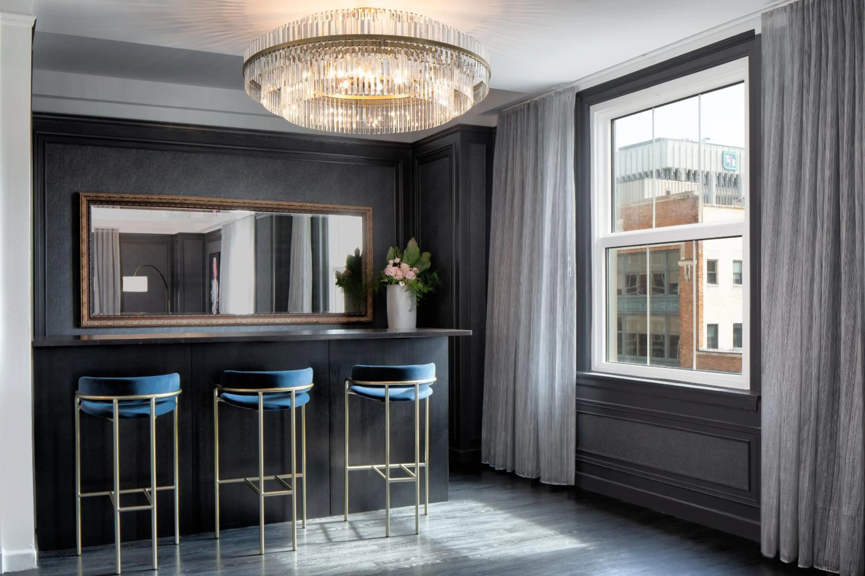 Living room in Amway Grand Plaza Hotel, Curio Collection by Hilton