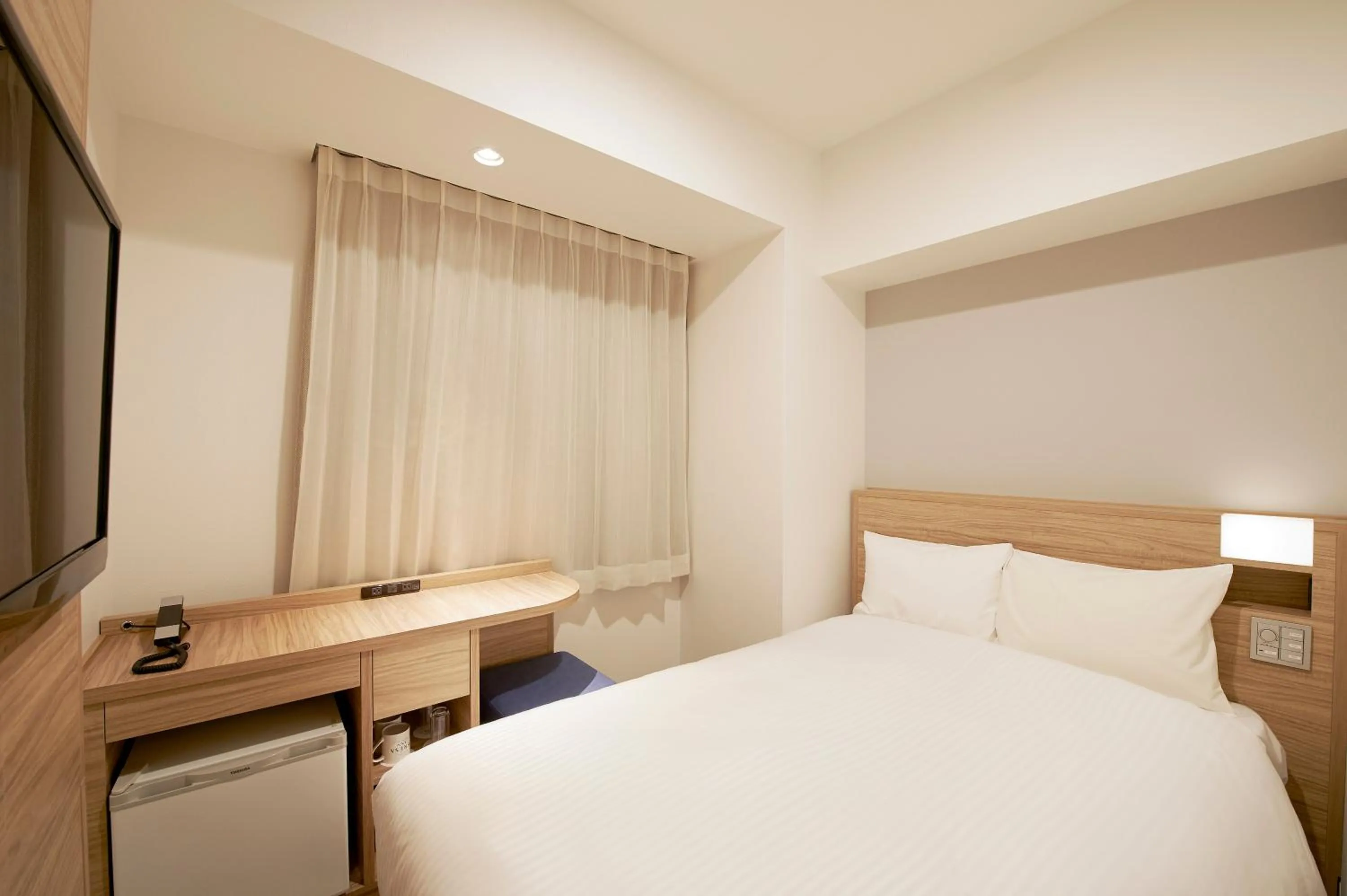 Bed in Sotetsu Fresa Inn Tokyo Kinshicho