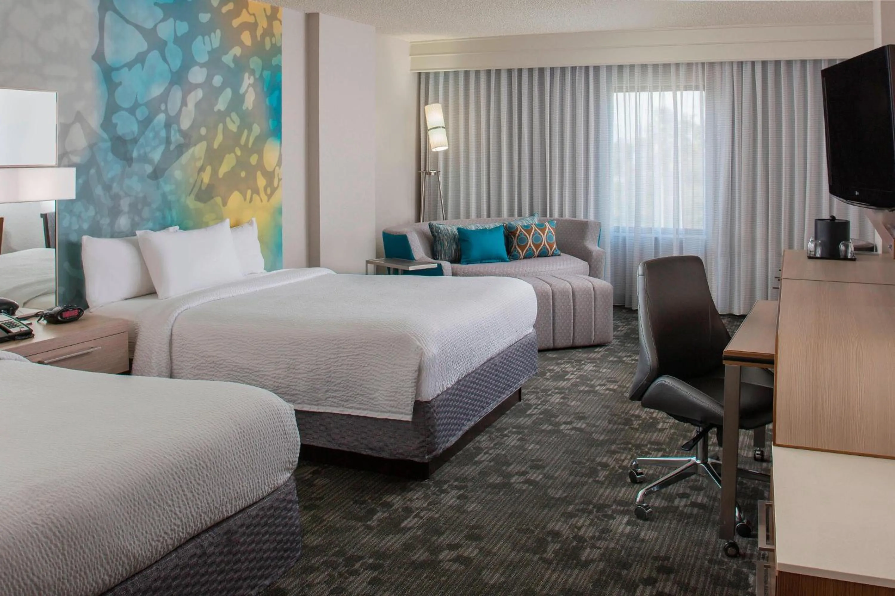 Photo of the whole room, Bed in Courtyard by Marriott Orlando Lake Buena Vista in the Marriott Village