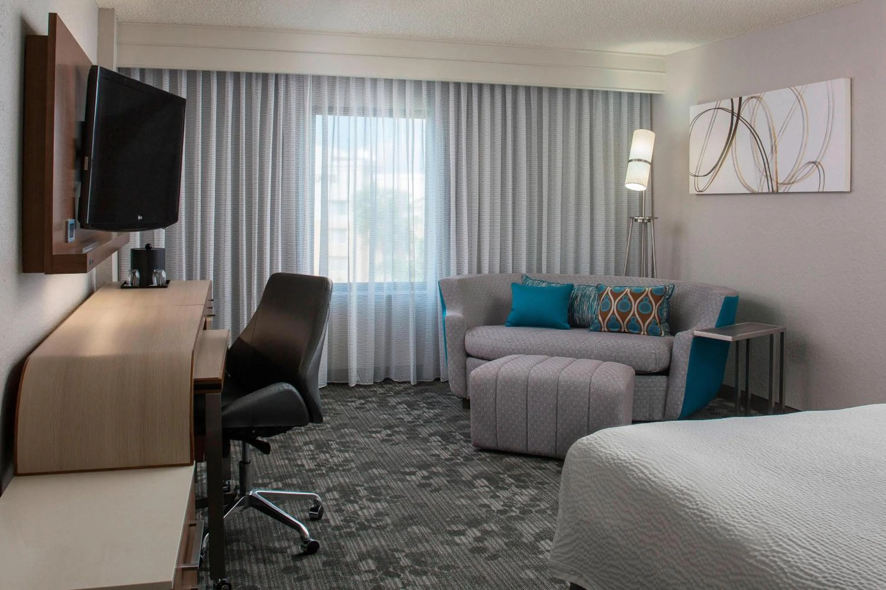 Photo of the whole room, Bed in Courtyard by Marriott Orlando Lake Buena Vista in the Marriott Village