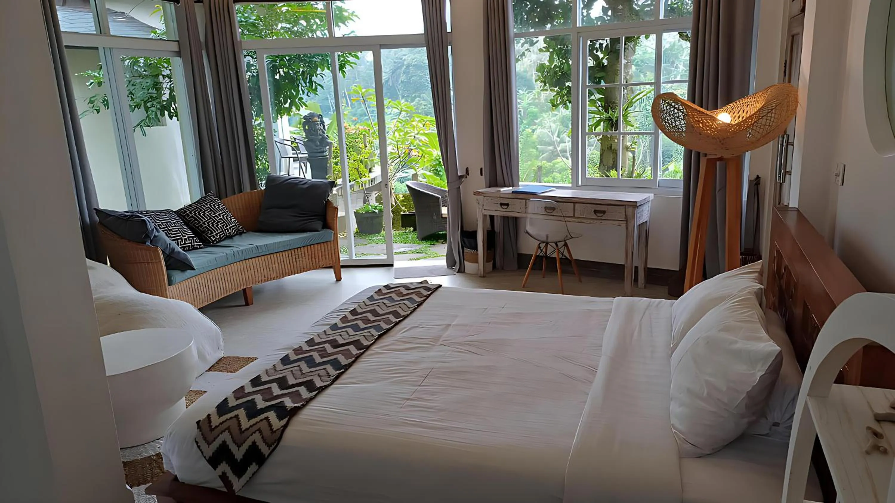 Bed in Tirta Asri Ubud Villa