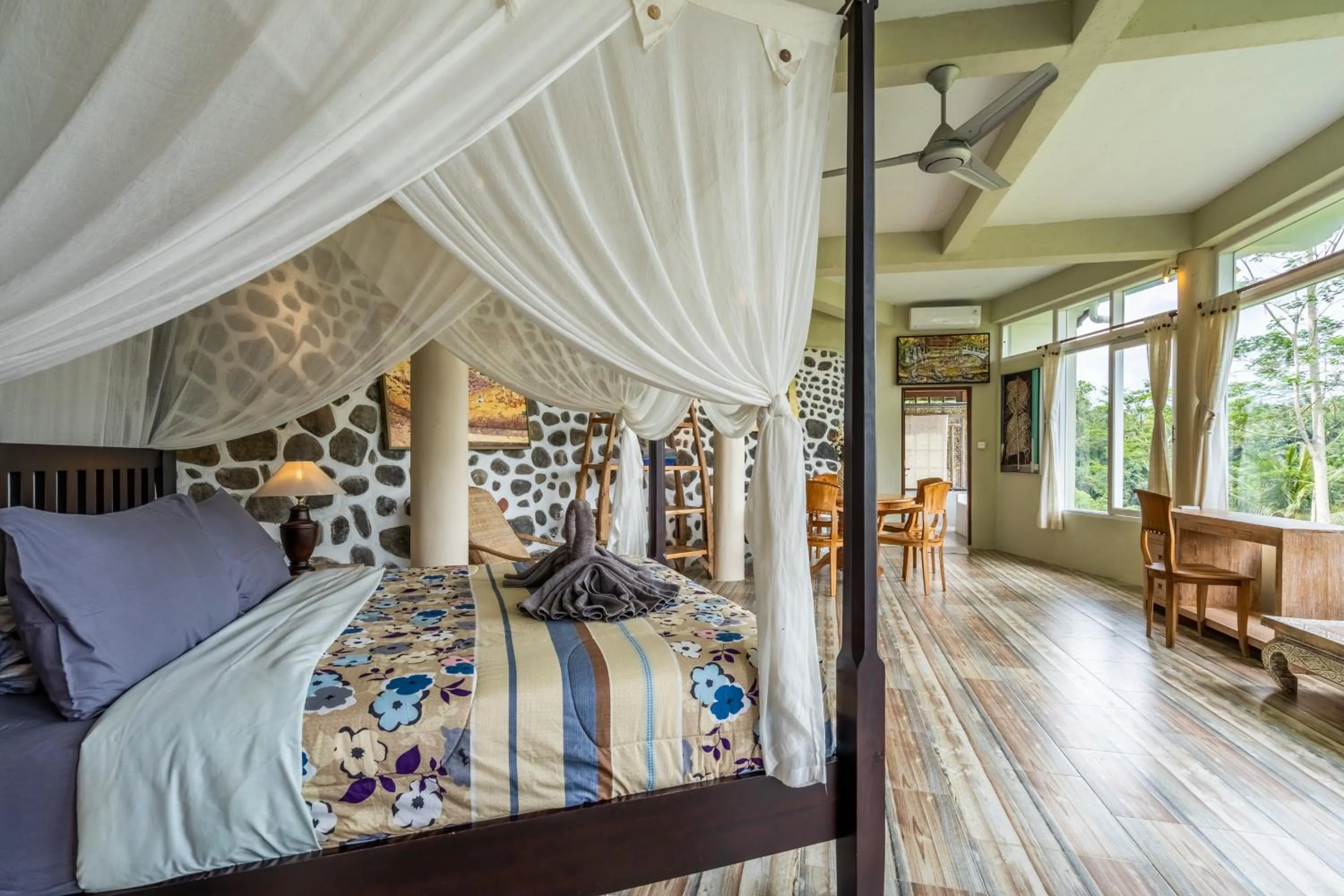 Bed in Tirta Asri Ubud Villa