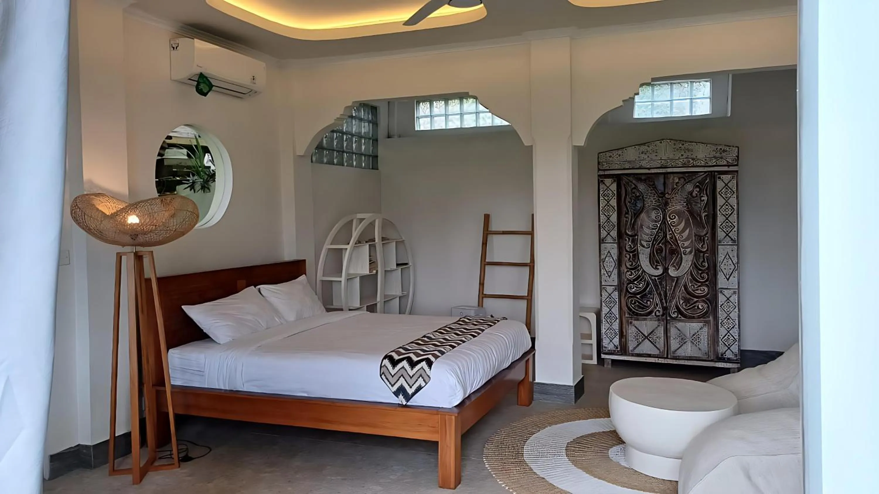Bed in Tirta Asri Ubud Villa