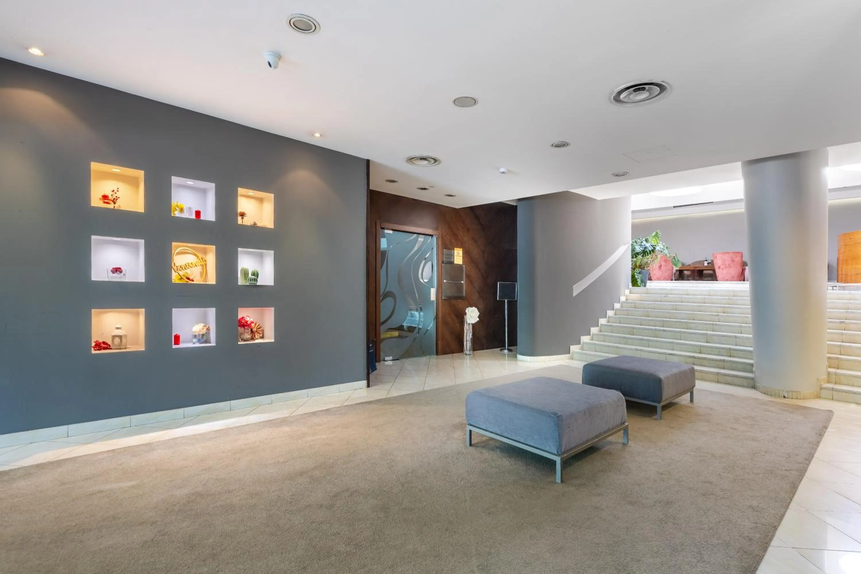 Lobby or reception in Aston Hotel