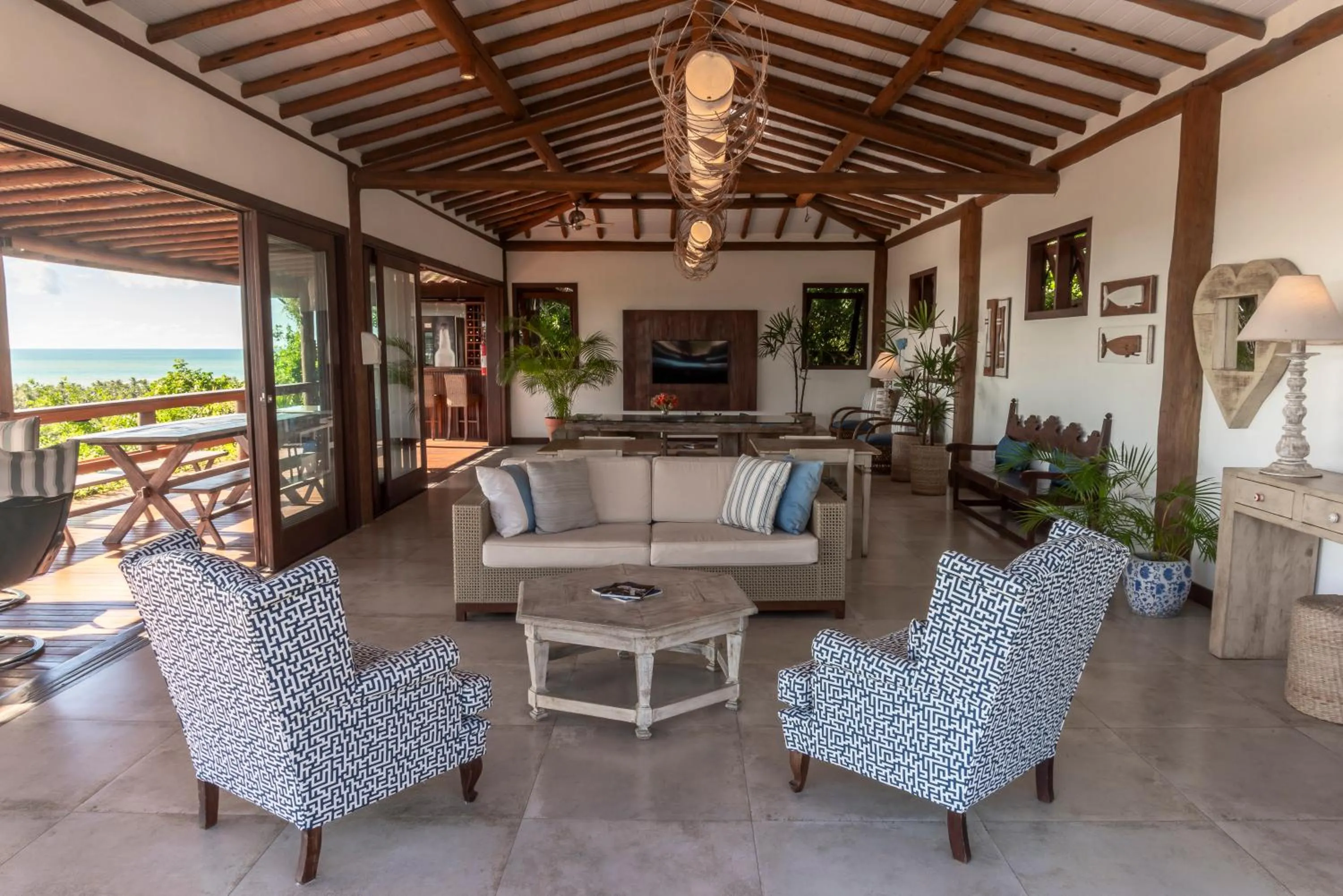 Communal lounge/ TV room in Manacá Pousada Parque