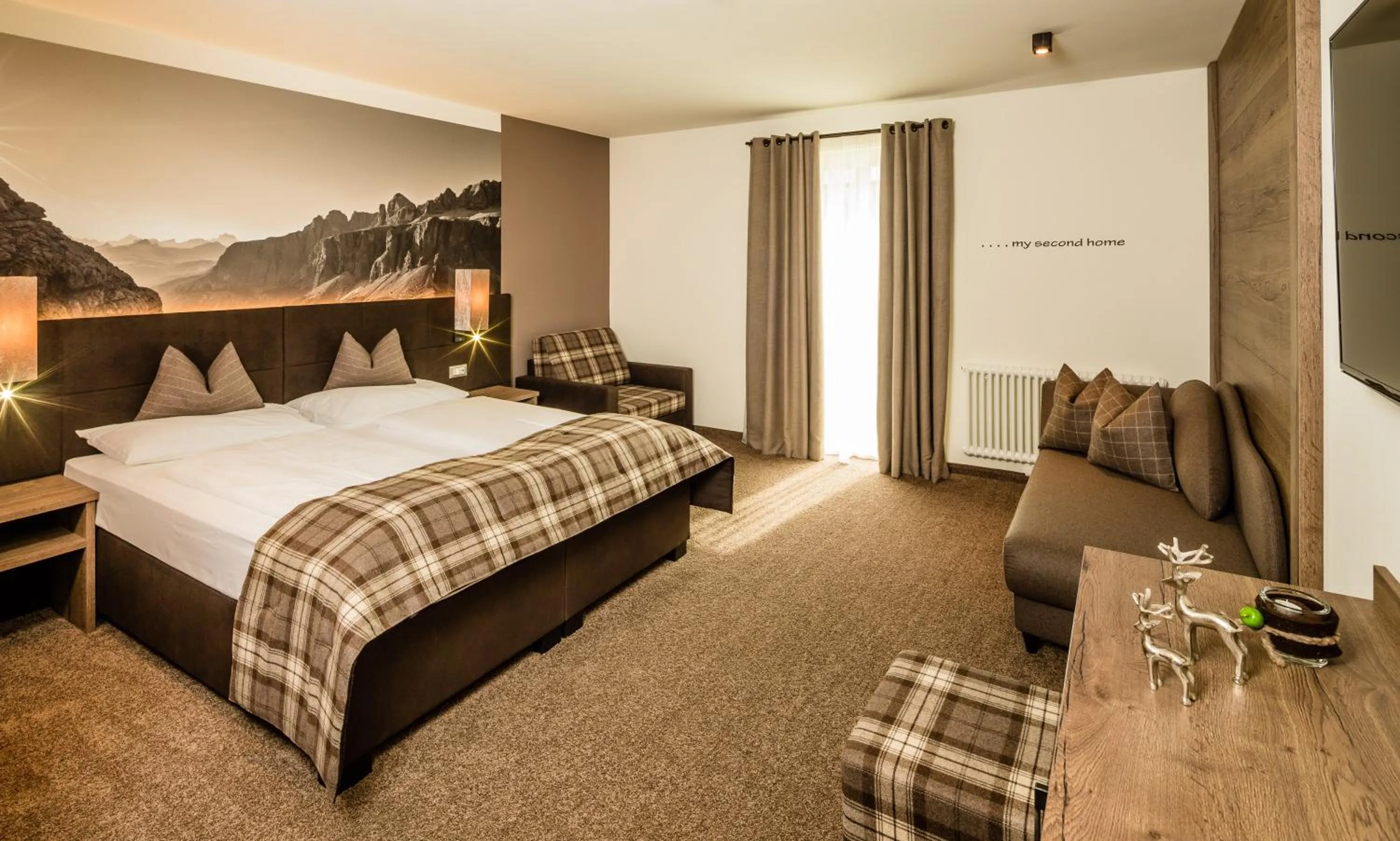 Photo of the whole room, Bed in Hotel Touring Dolomites