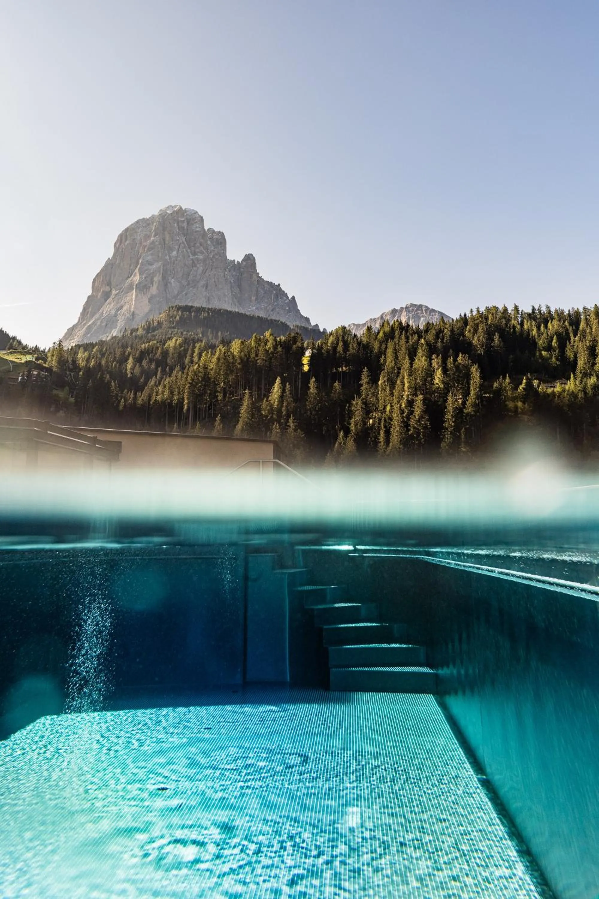 Swimming pool in Hotel Touring Dolomites