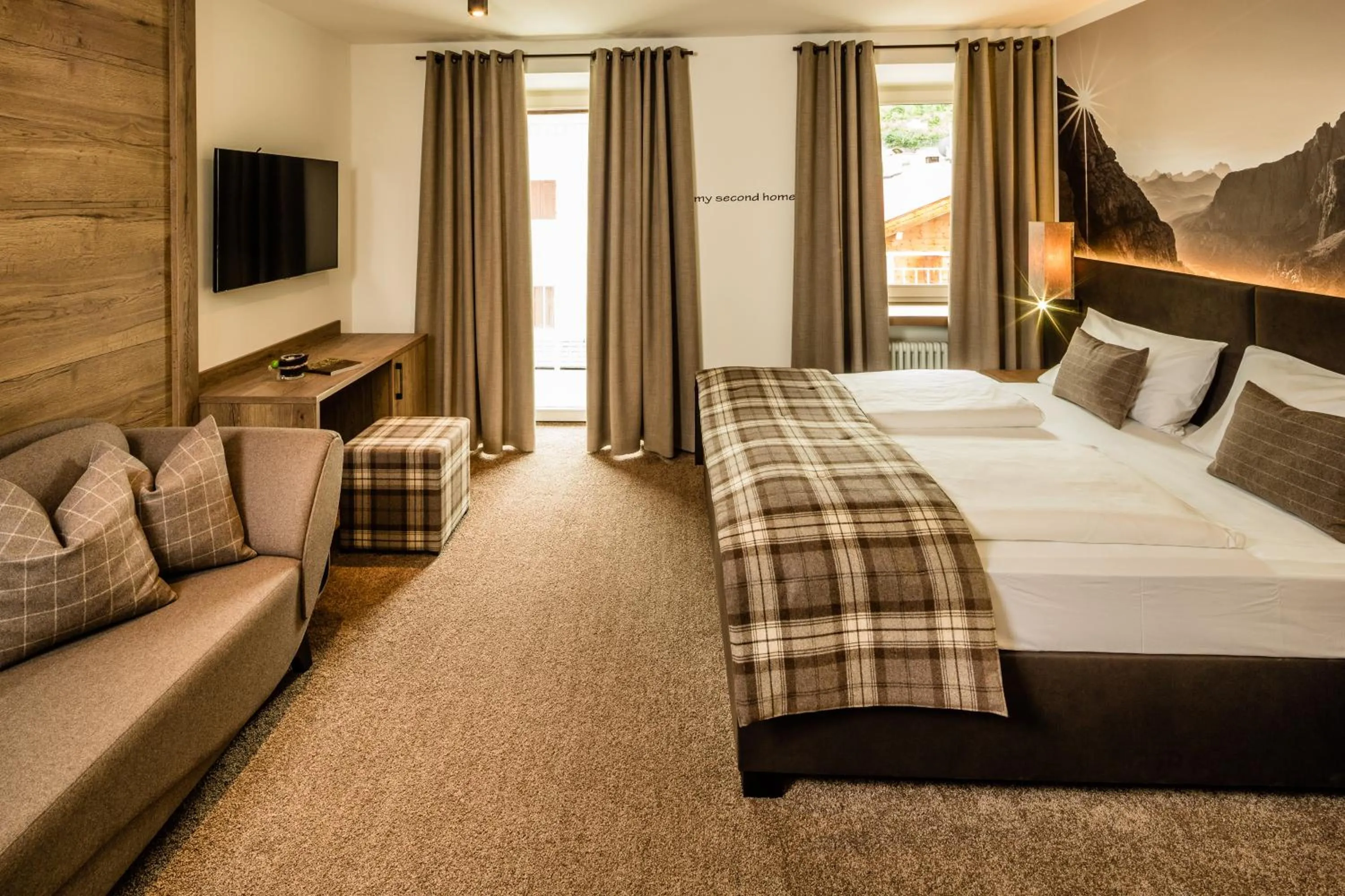 Photo of the whole room, Bed in Hotel Touring Dolomites