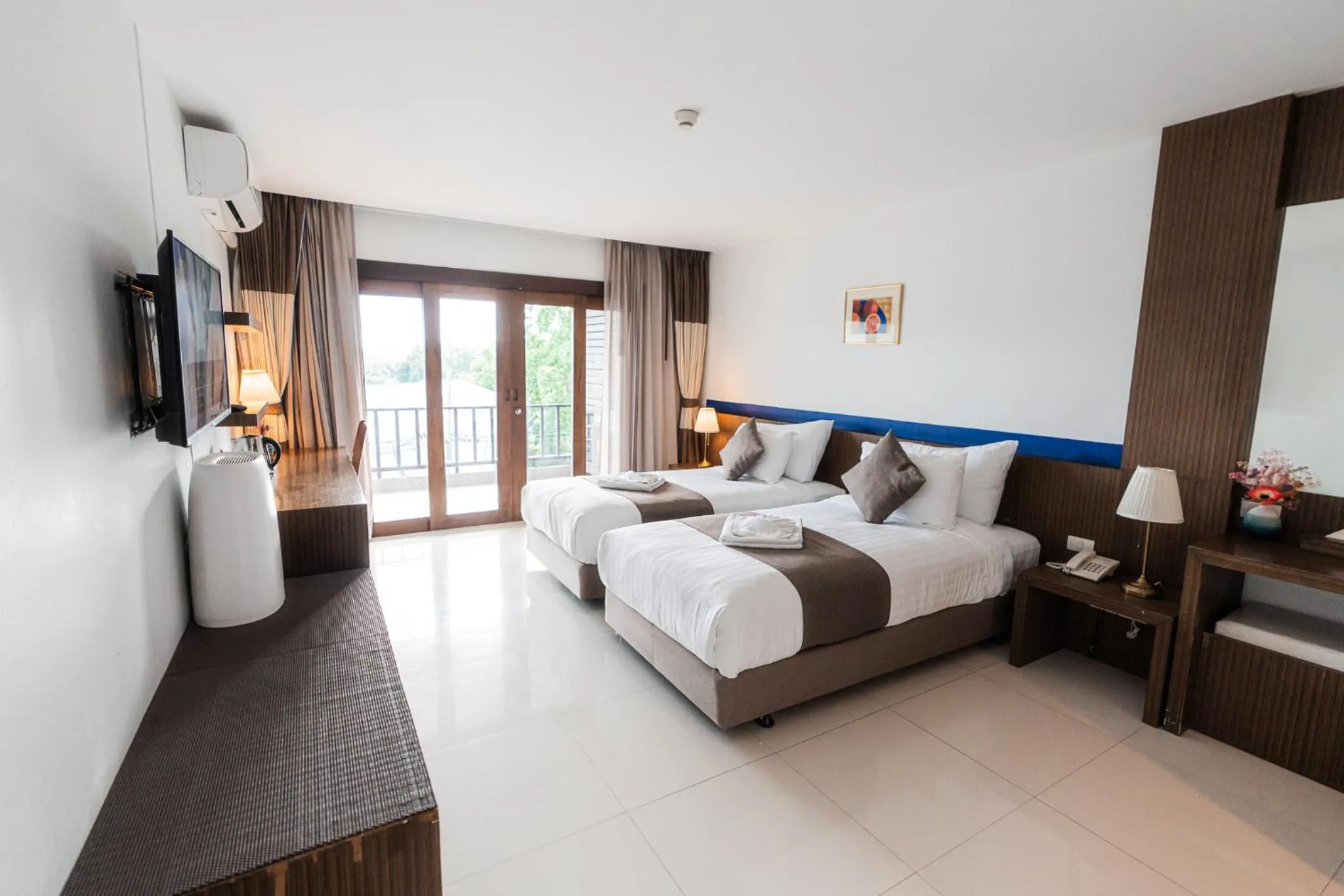 Bed in Siam Triangle Hotel Chiang Sean