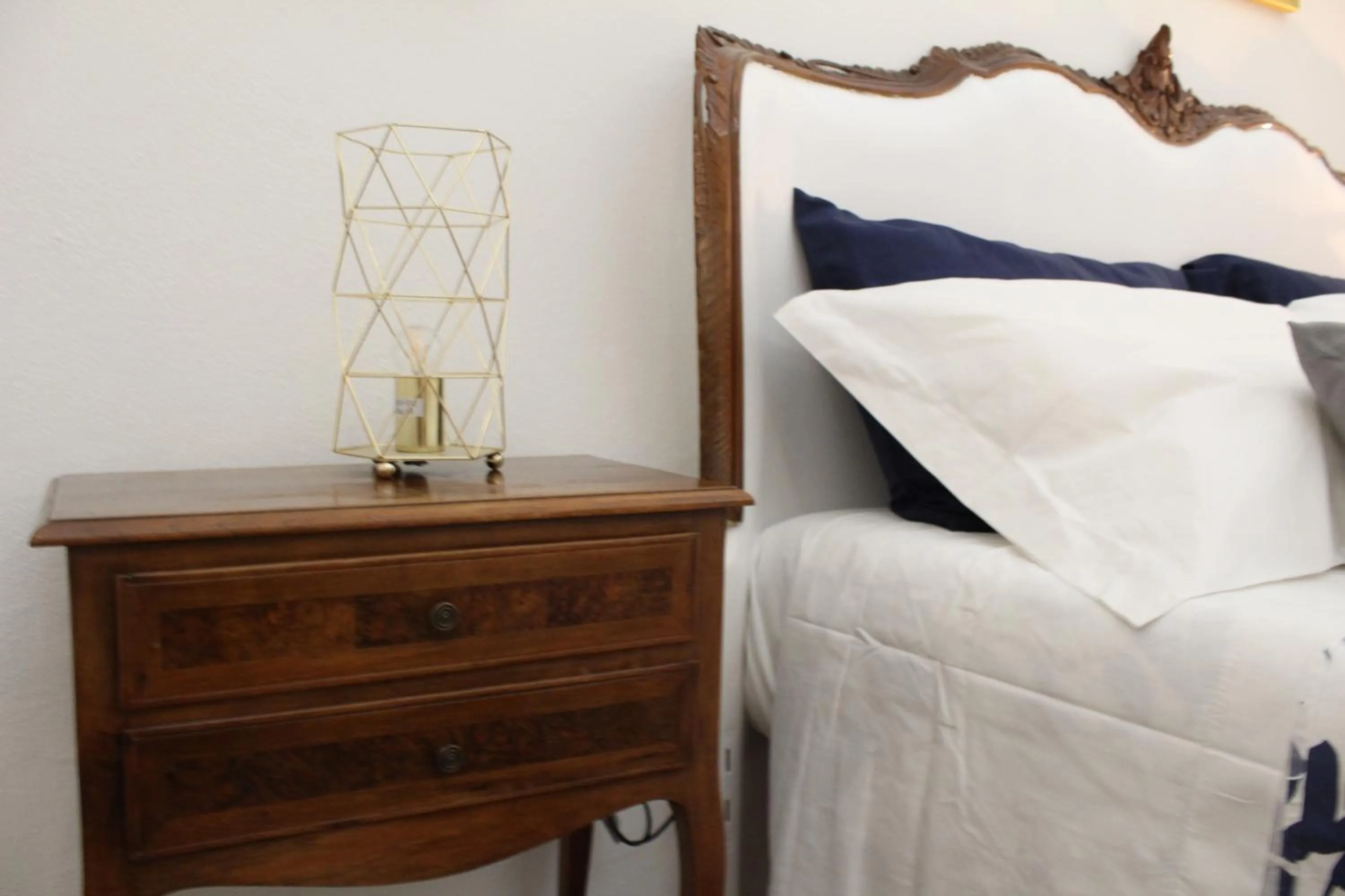 Bed in Rooms H Ercolani