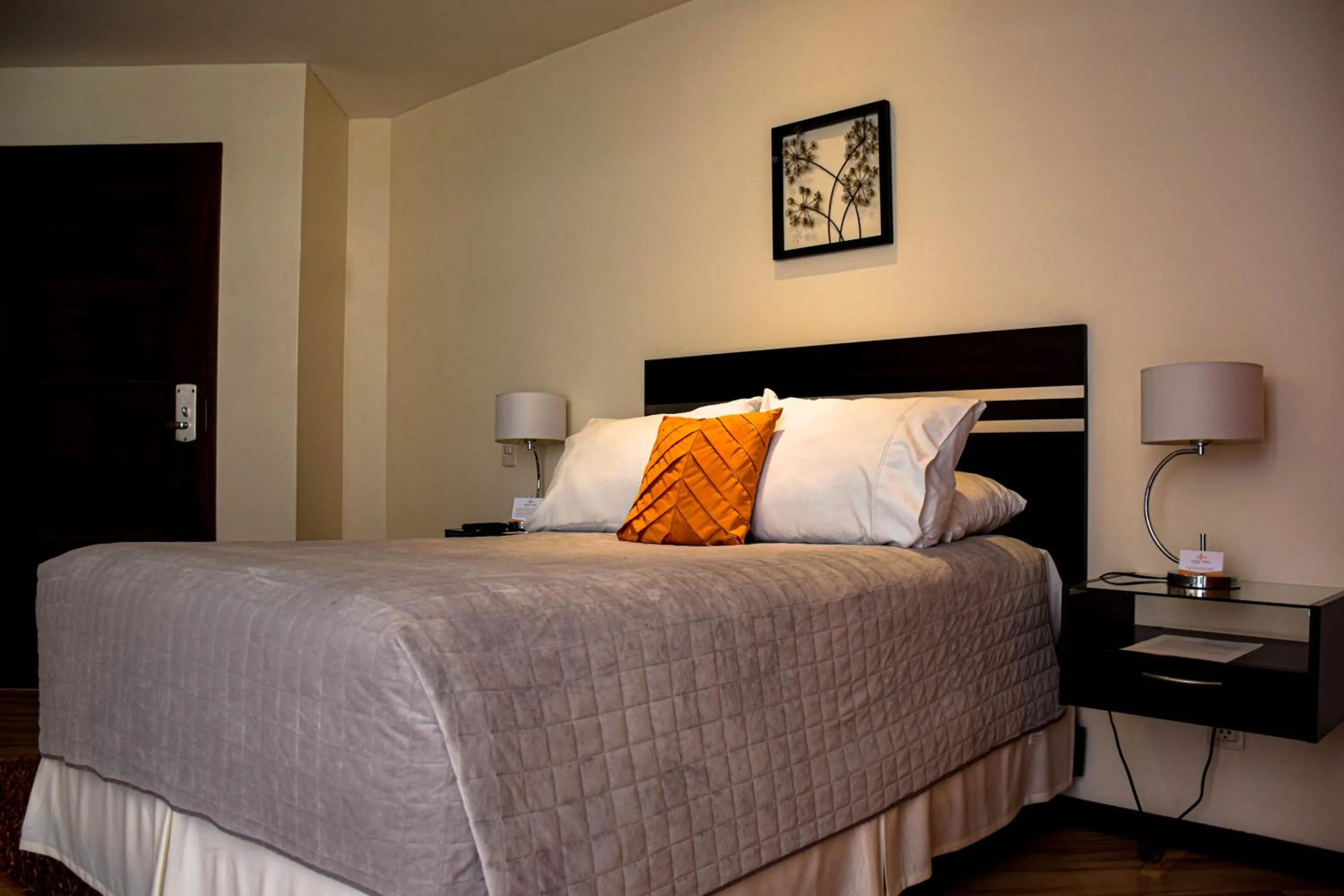 Bed in Hotel NC La Paz