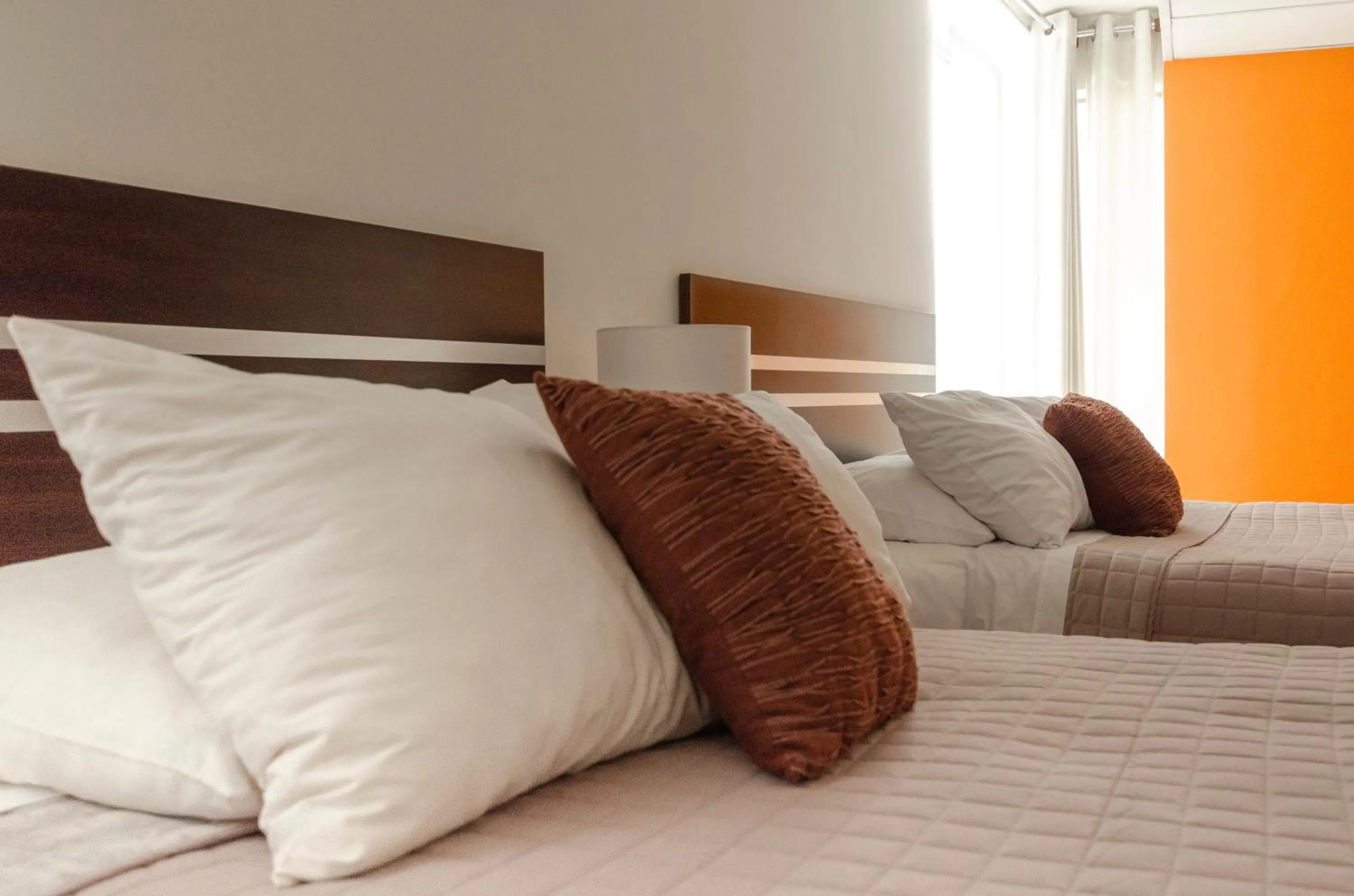 Bed in Hotel NC La Paz