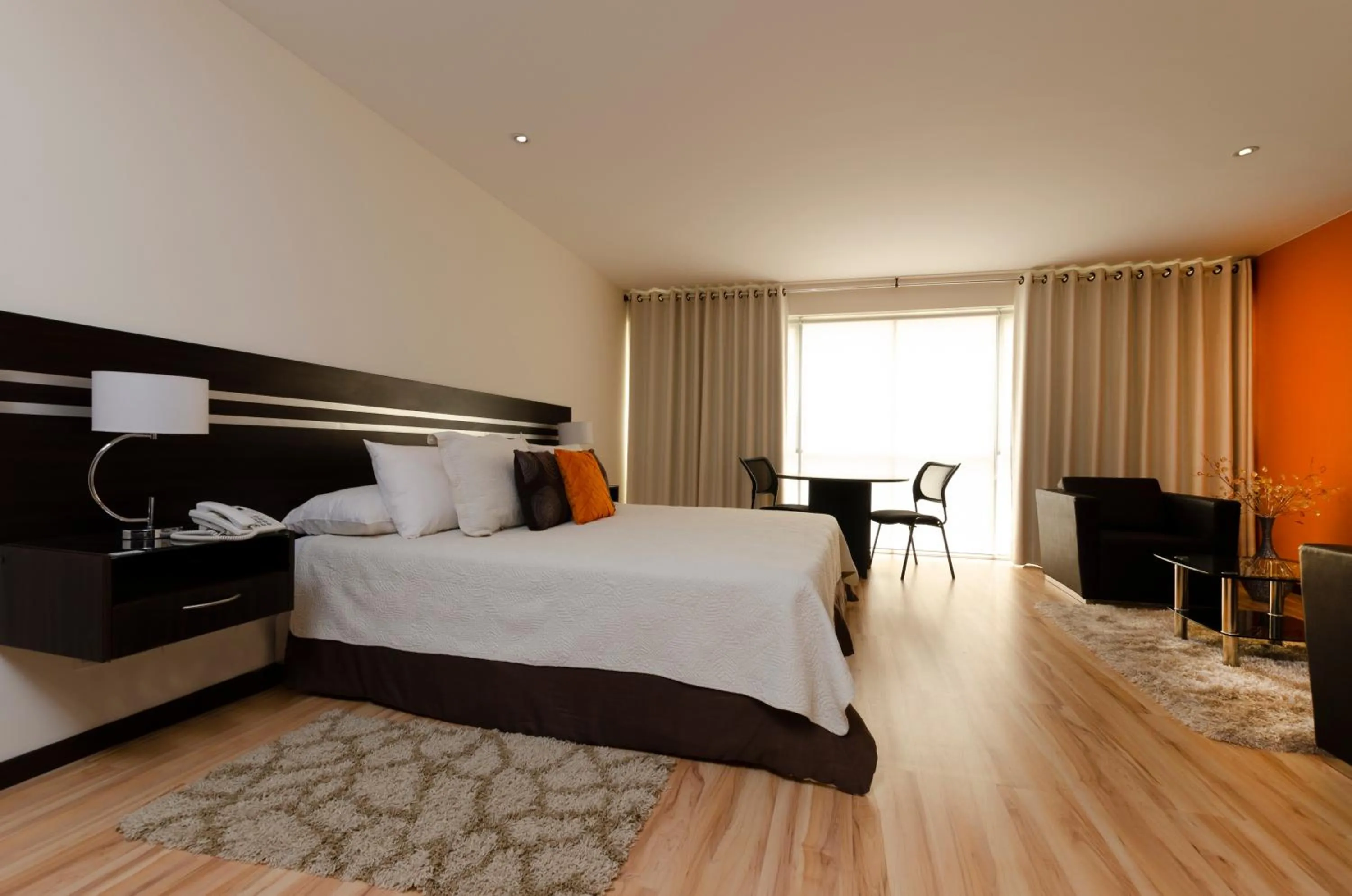 Bed in Hotel NC La Paz