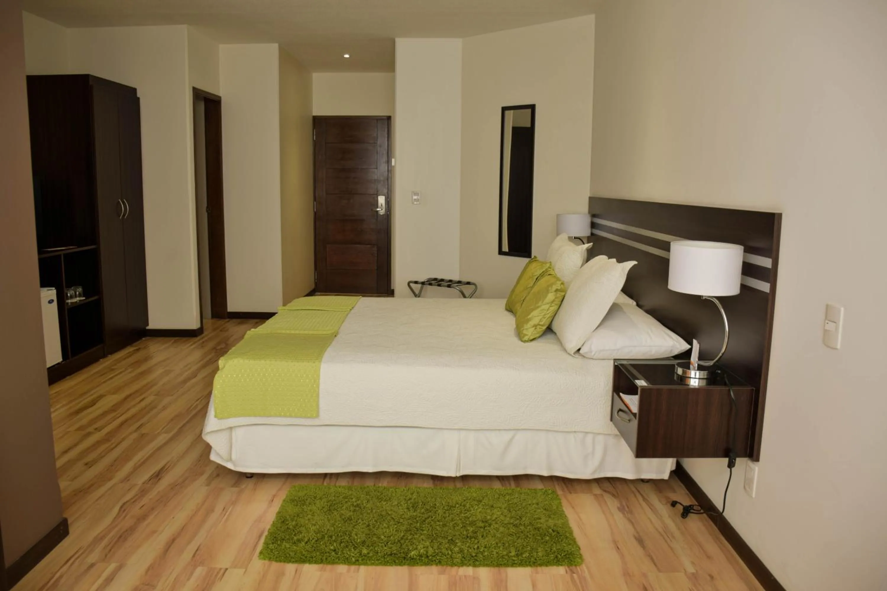 Bed in Hotel NC La Paz