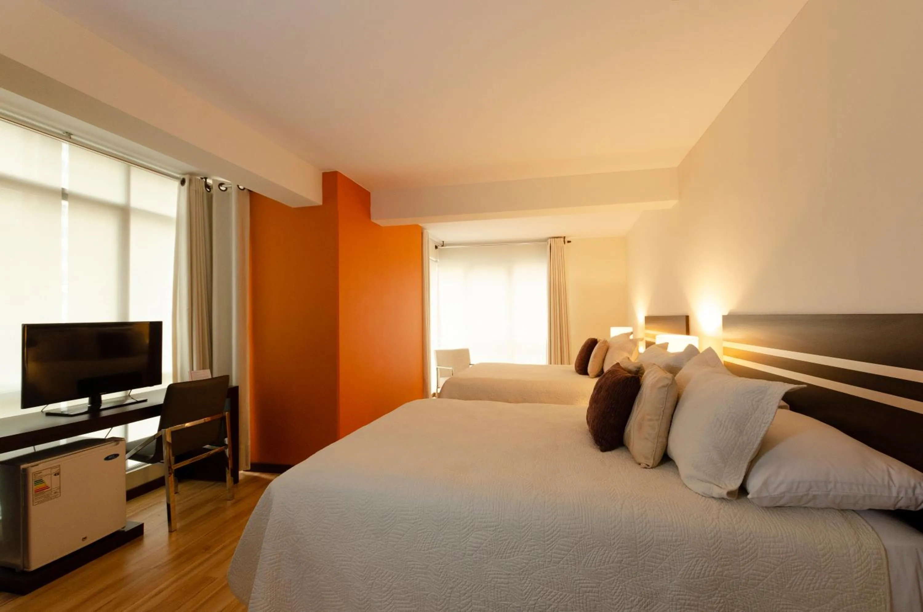 Bed in Hotel NC La Paz