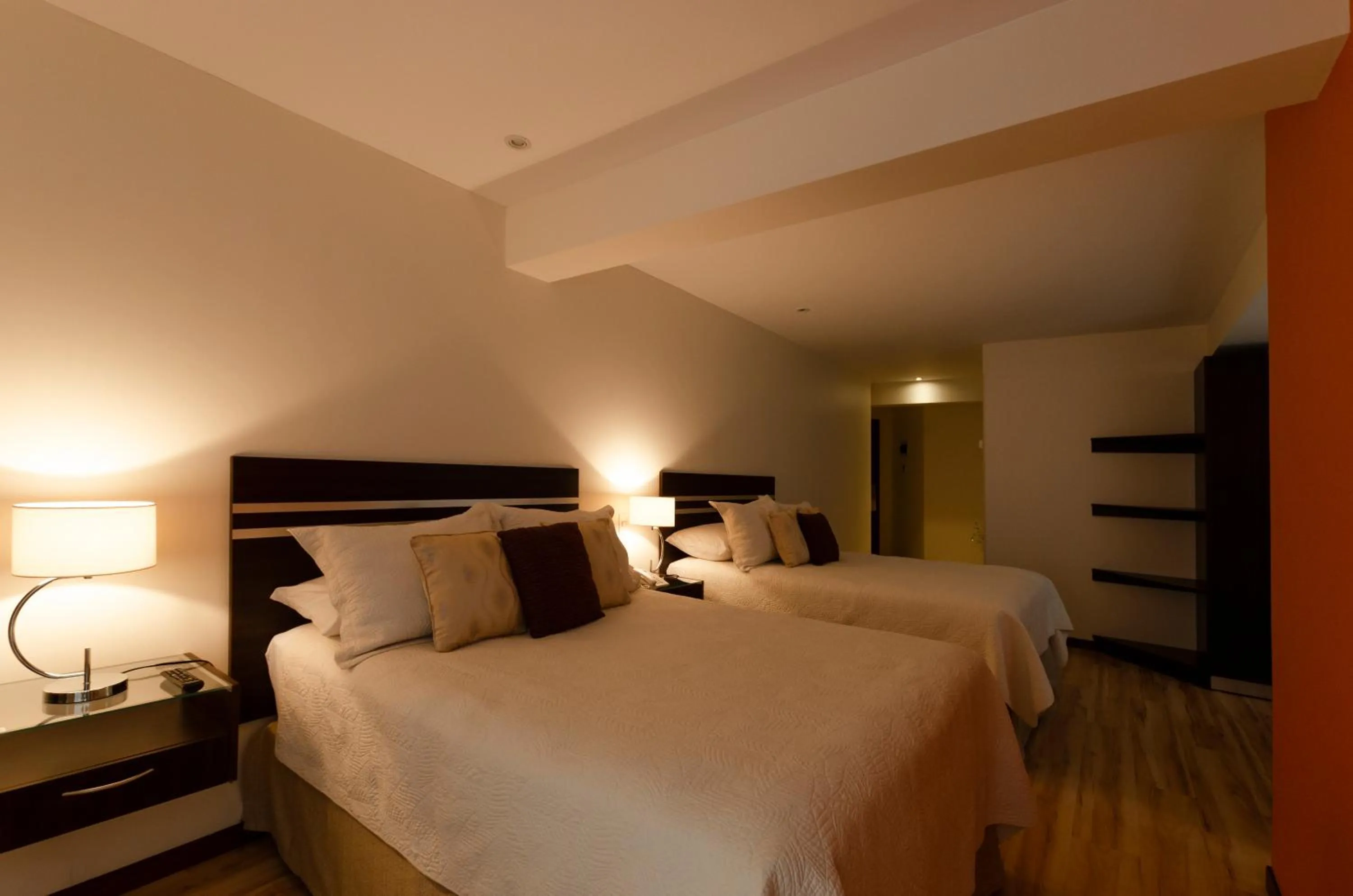 Bed in Hotel NC La Paz