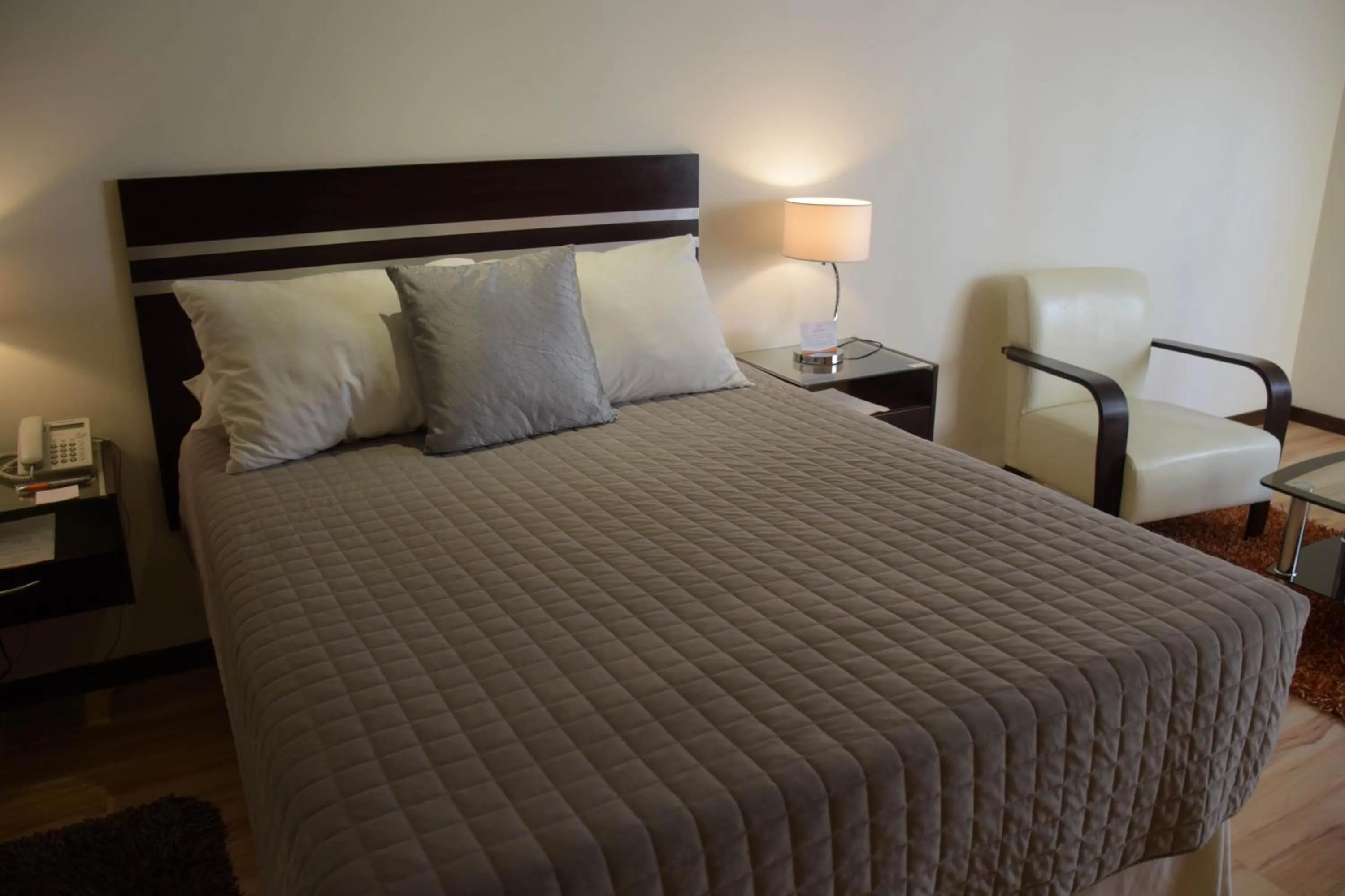 Bed in Hotel NC La Paz