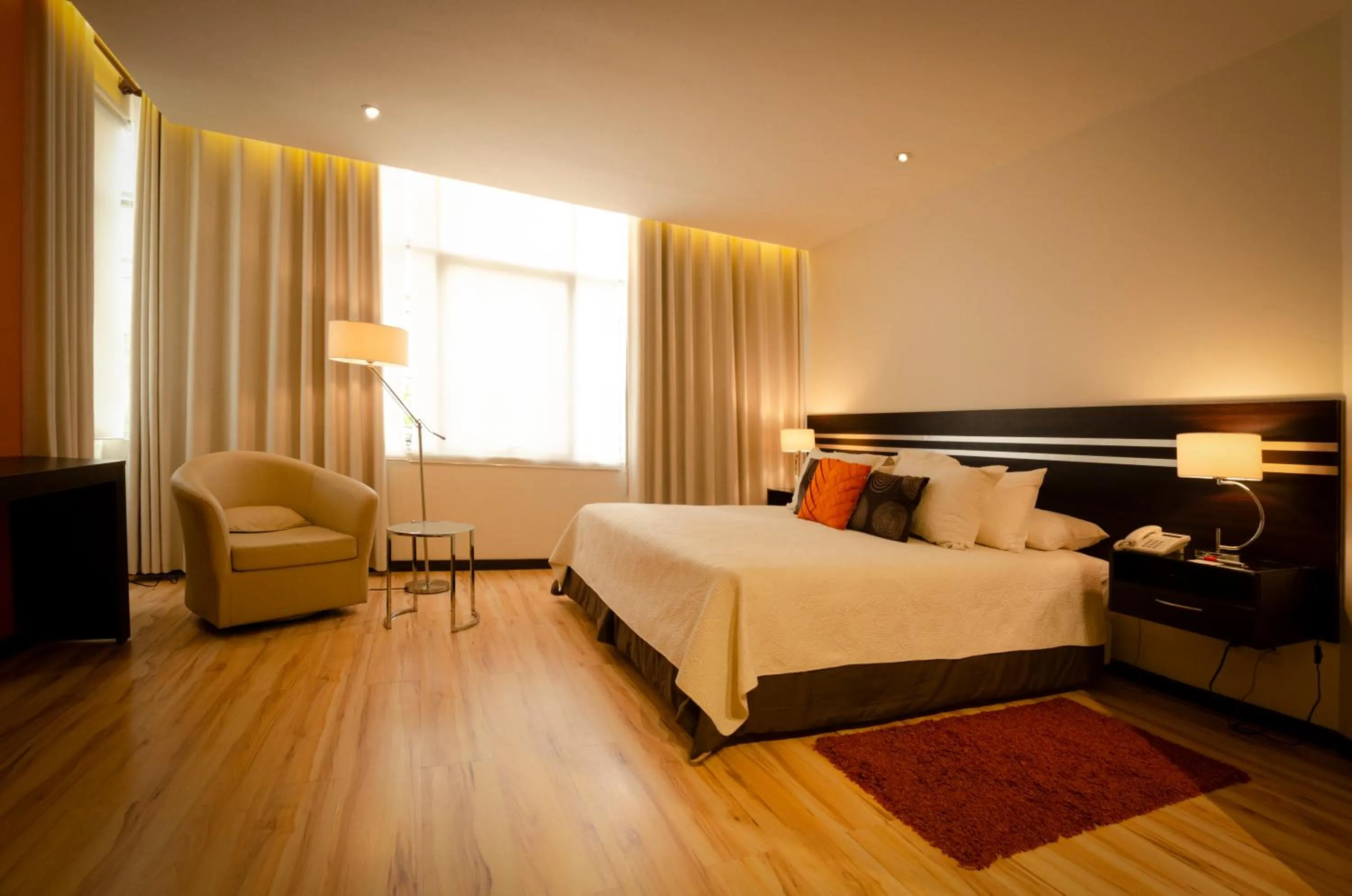 Bed in Hotel NC La Paz