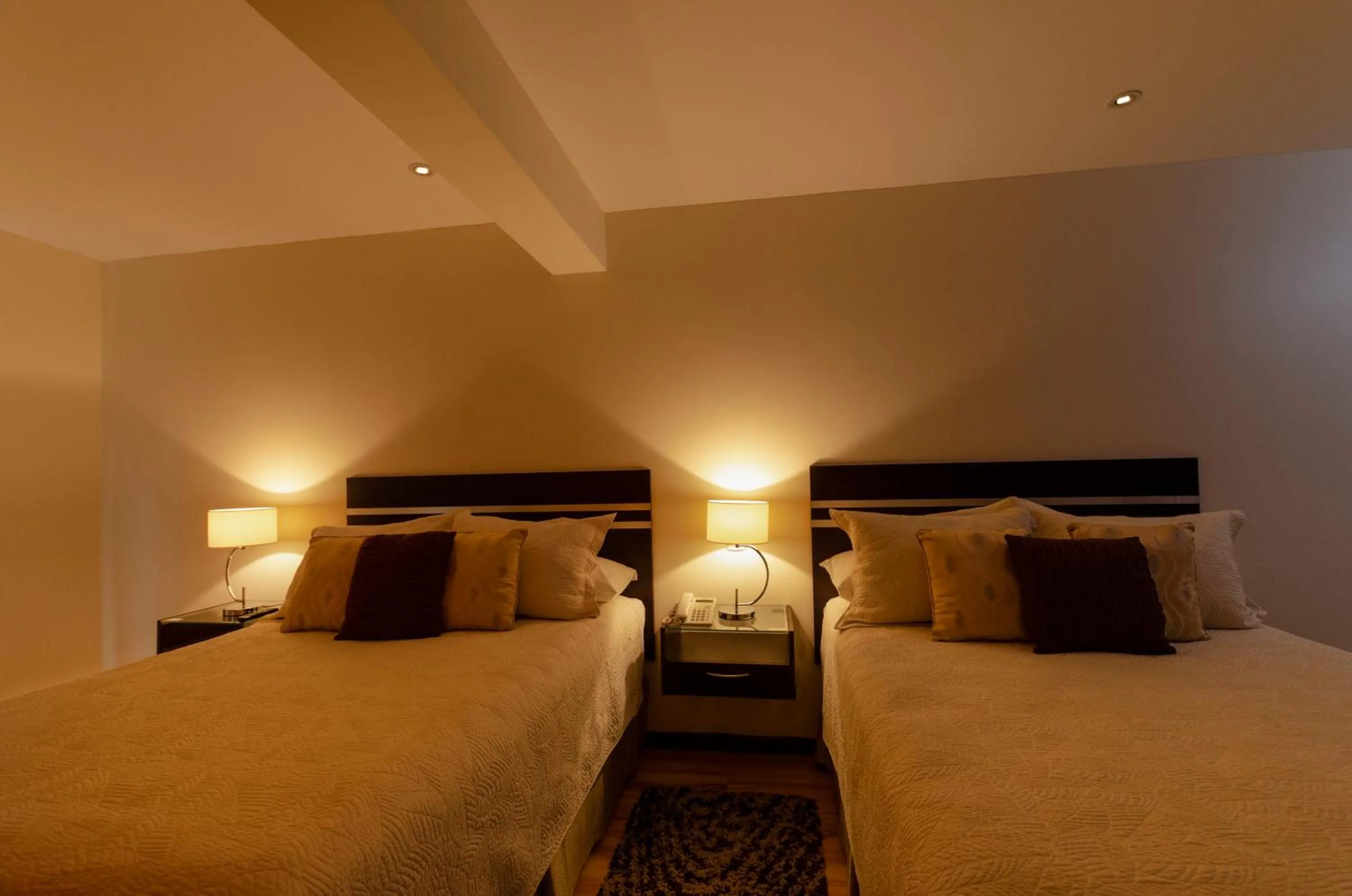 Bed in Hotel NC La Paz
