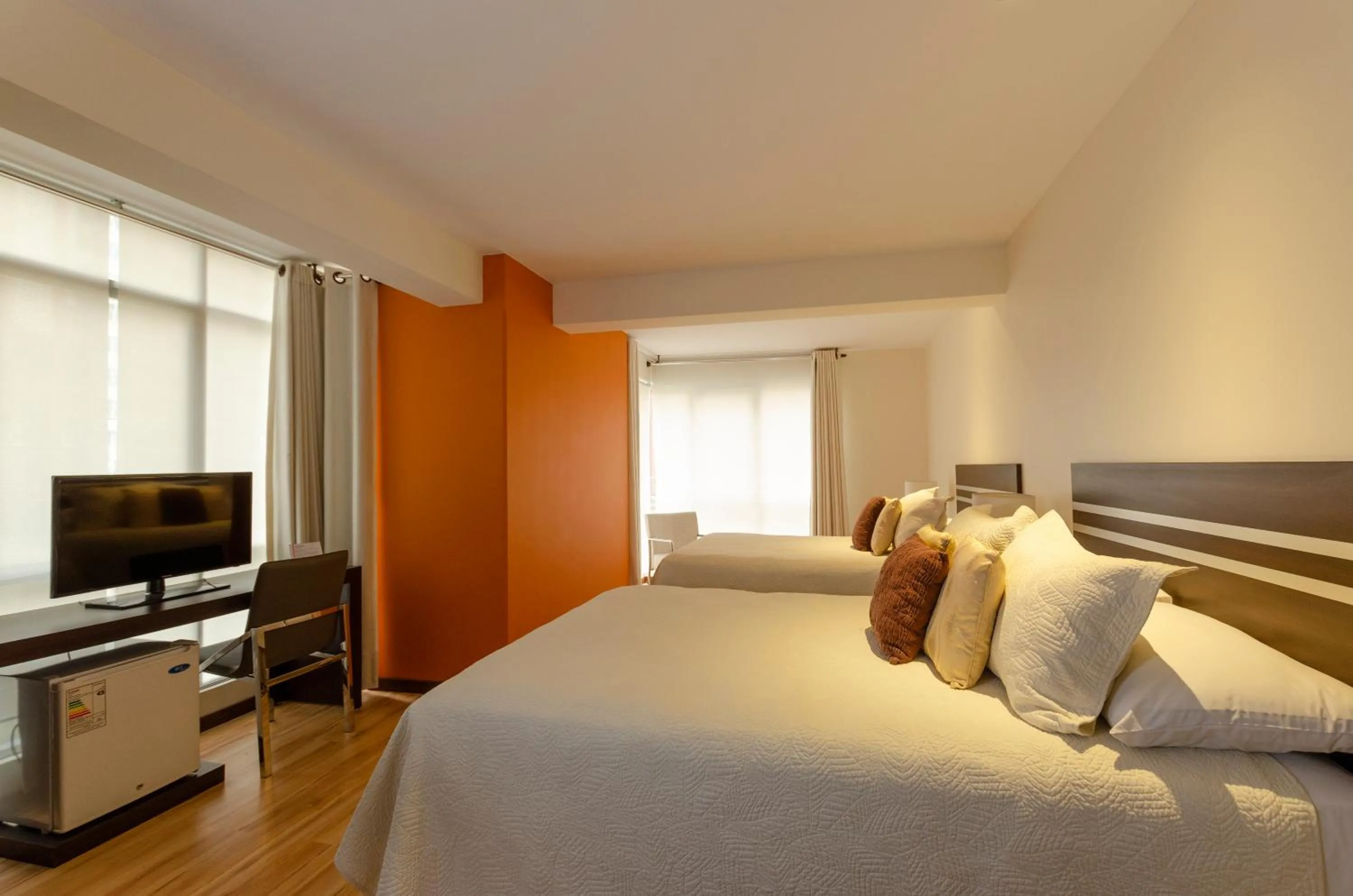 Bed in Hotel NC La Paz