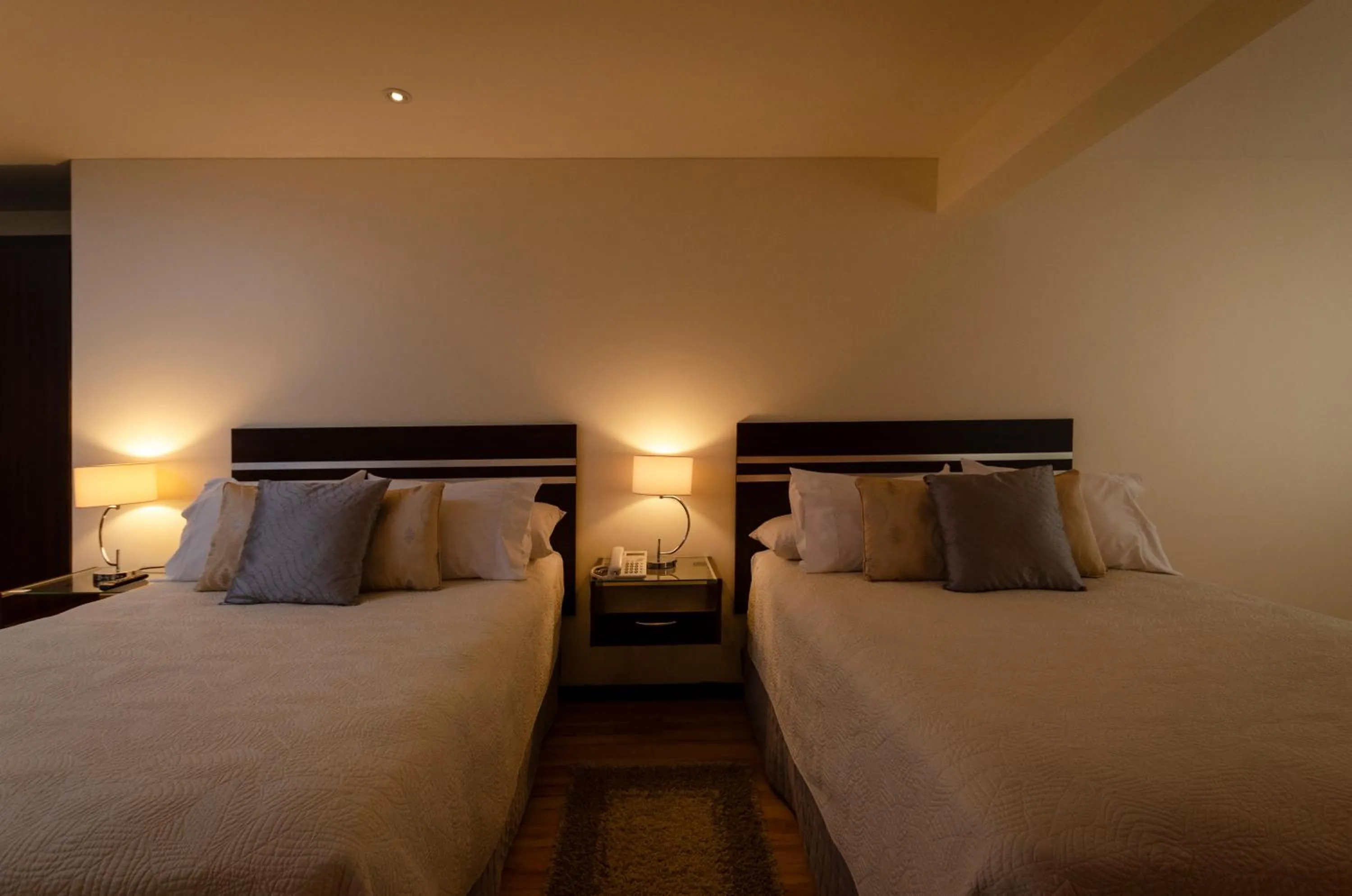 Bed in Hotel NC La Paz