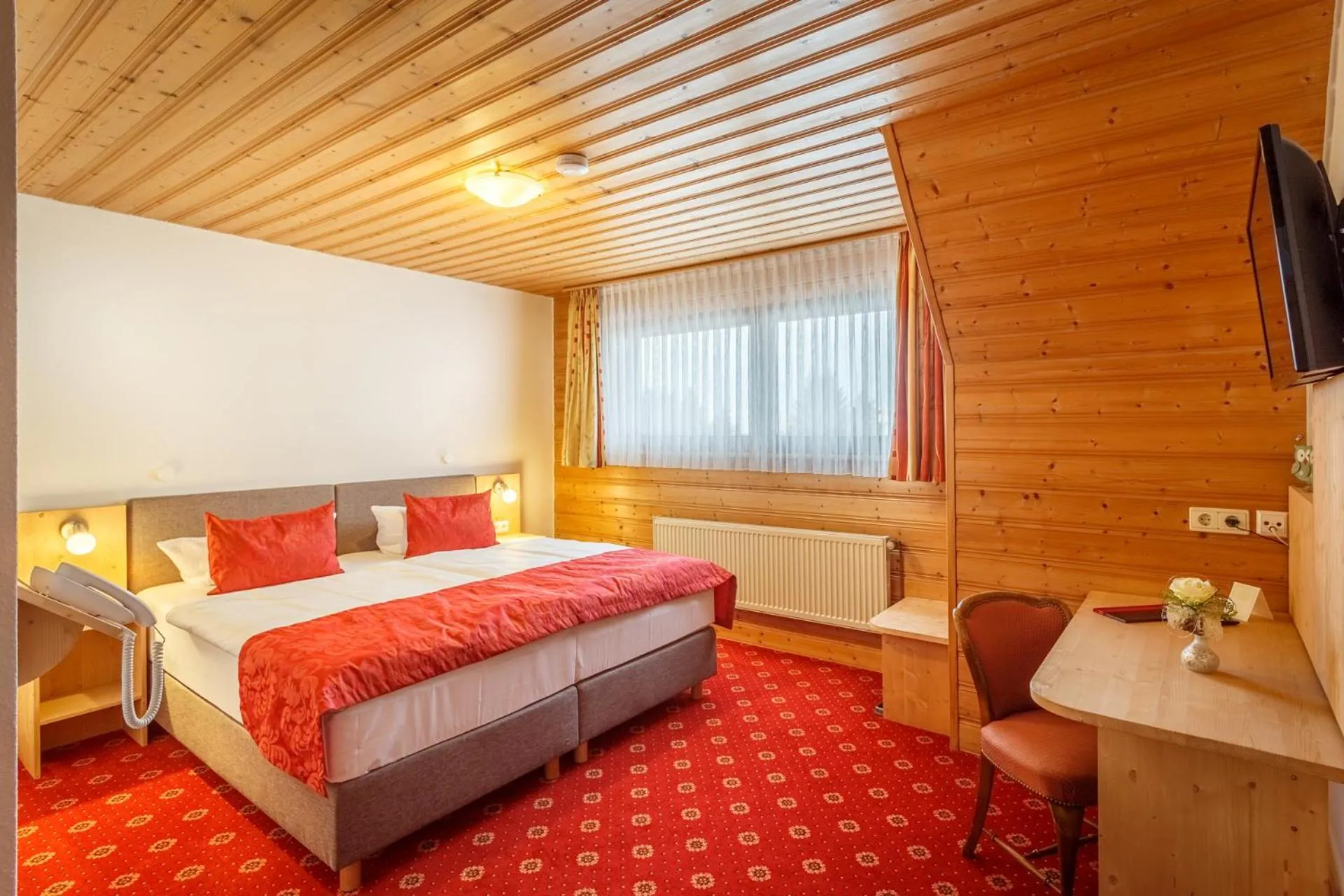 Photo of the whole room, Bed in Landhotel Bartlehof