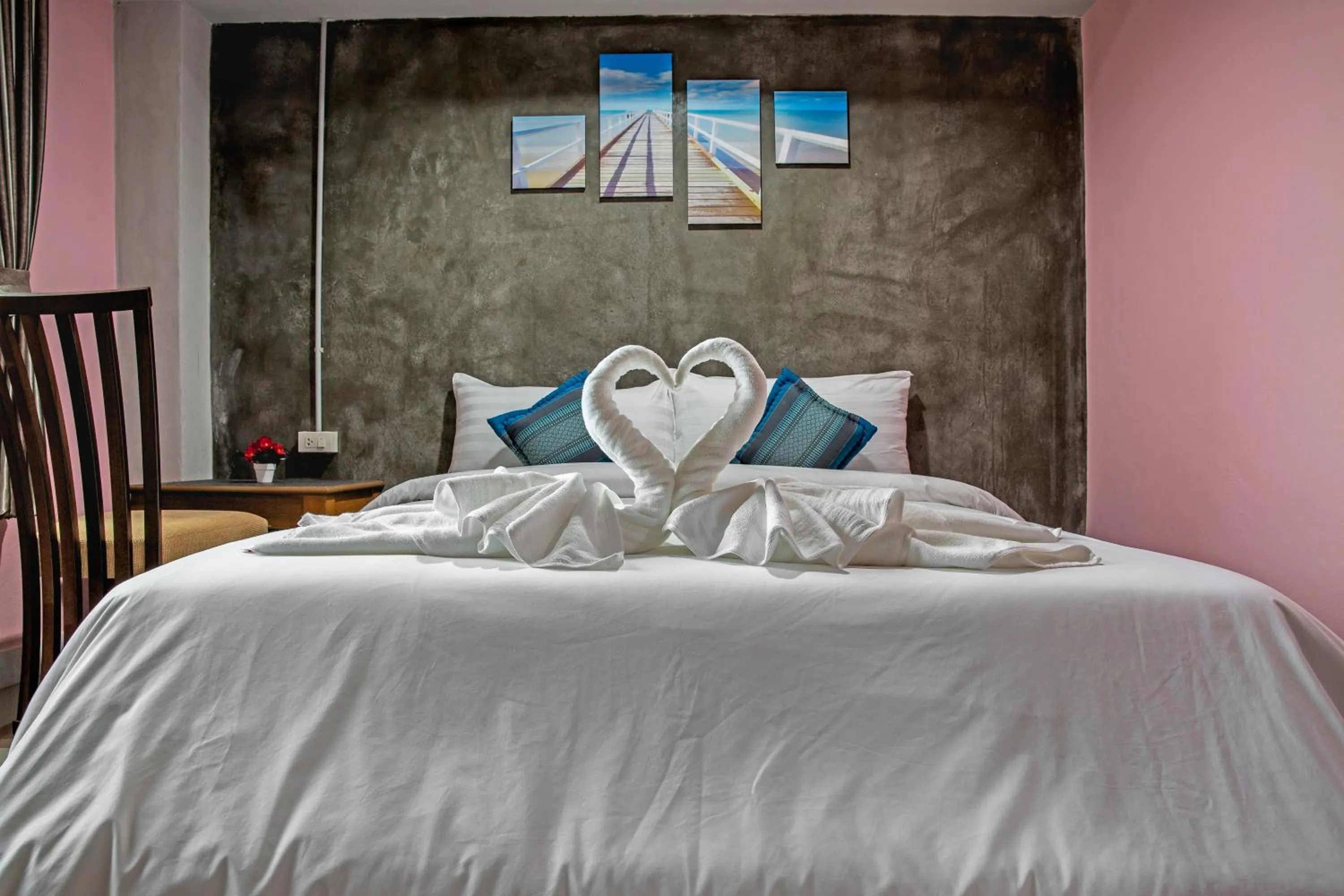 Bed in The Guest Hotel Krabi