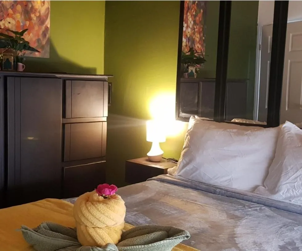 Photo of the whole room, Bed in El Encanto Condominiums