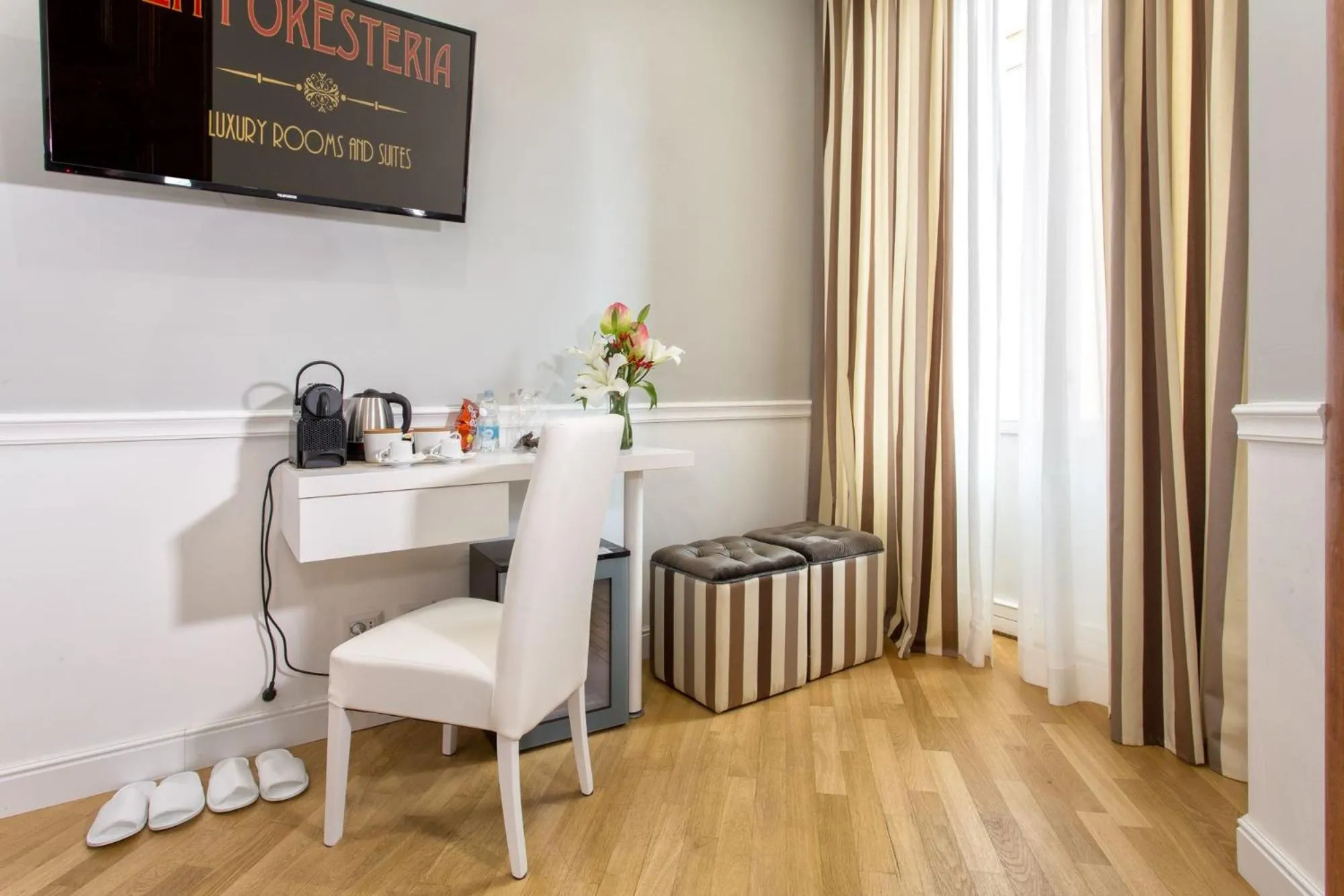 Photo of the whole room in La Foresteria Luxury Suites