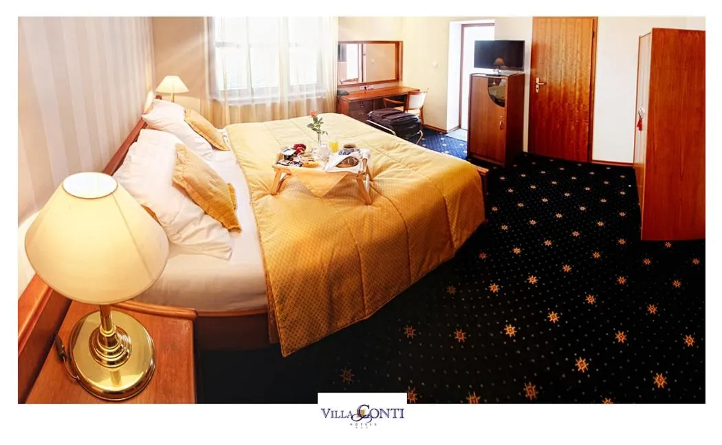 Text overlay, Bed in Hotel Villa Conti