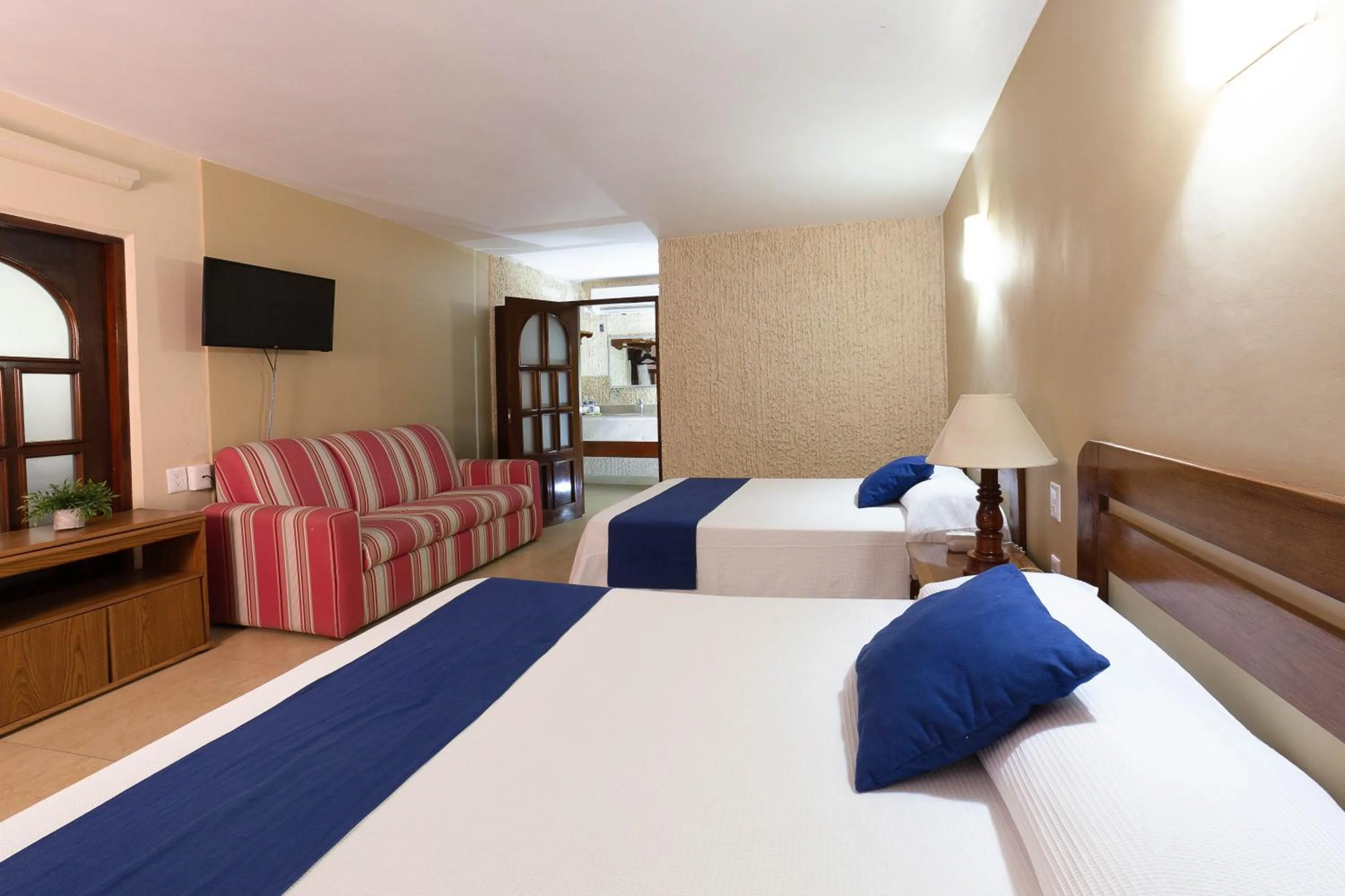 Bed in Hotel Plaza Palmas