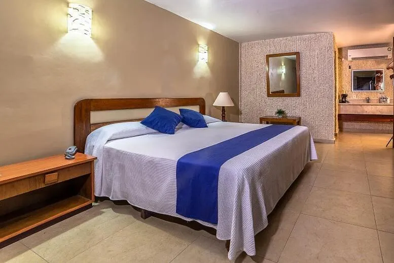 Bed in Hotel Plaza Palmas