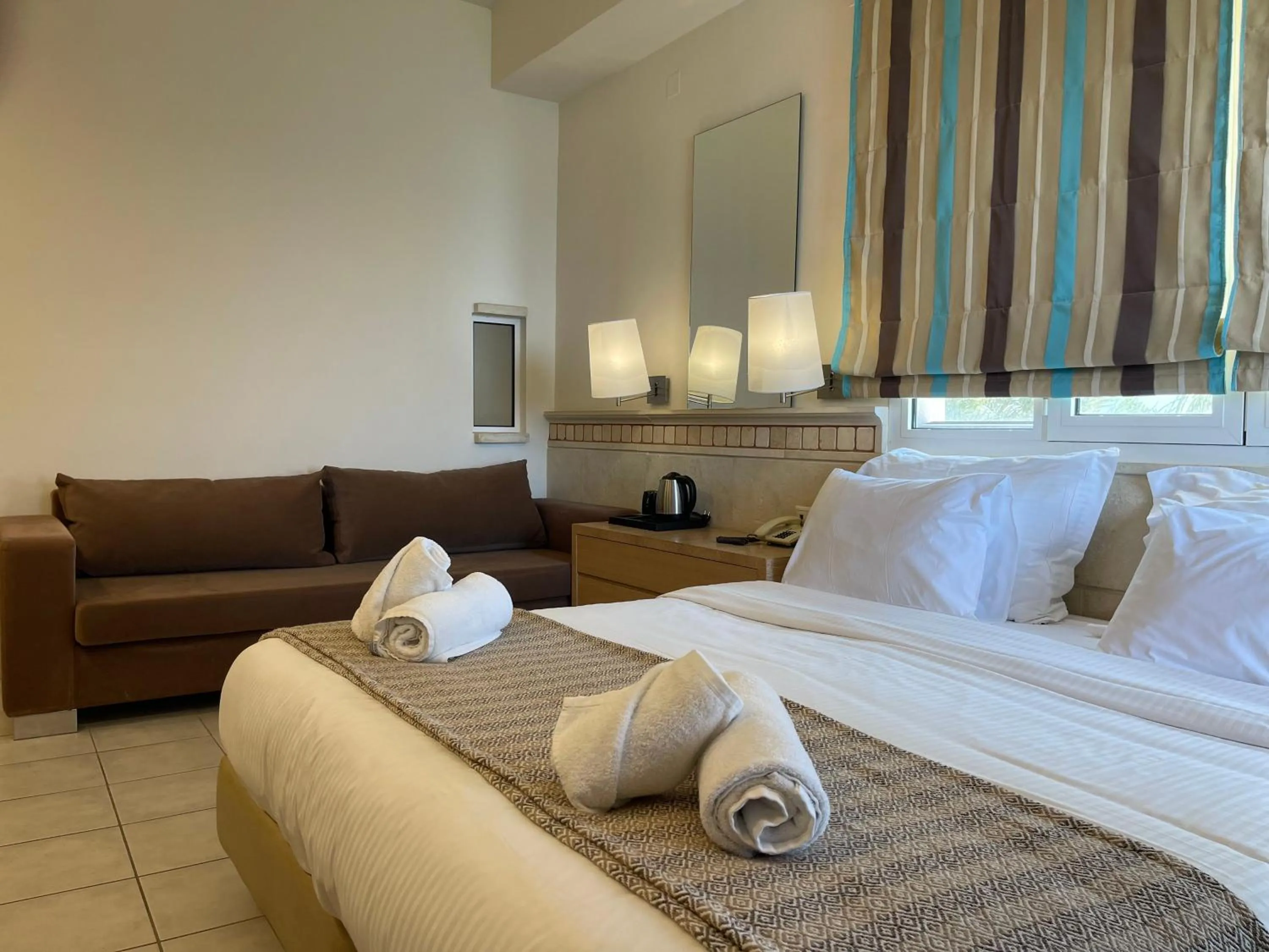 Bedroom in Glaros Beach Hotel