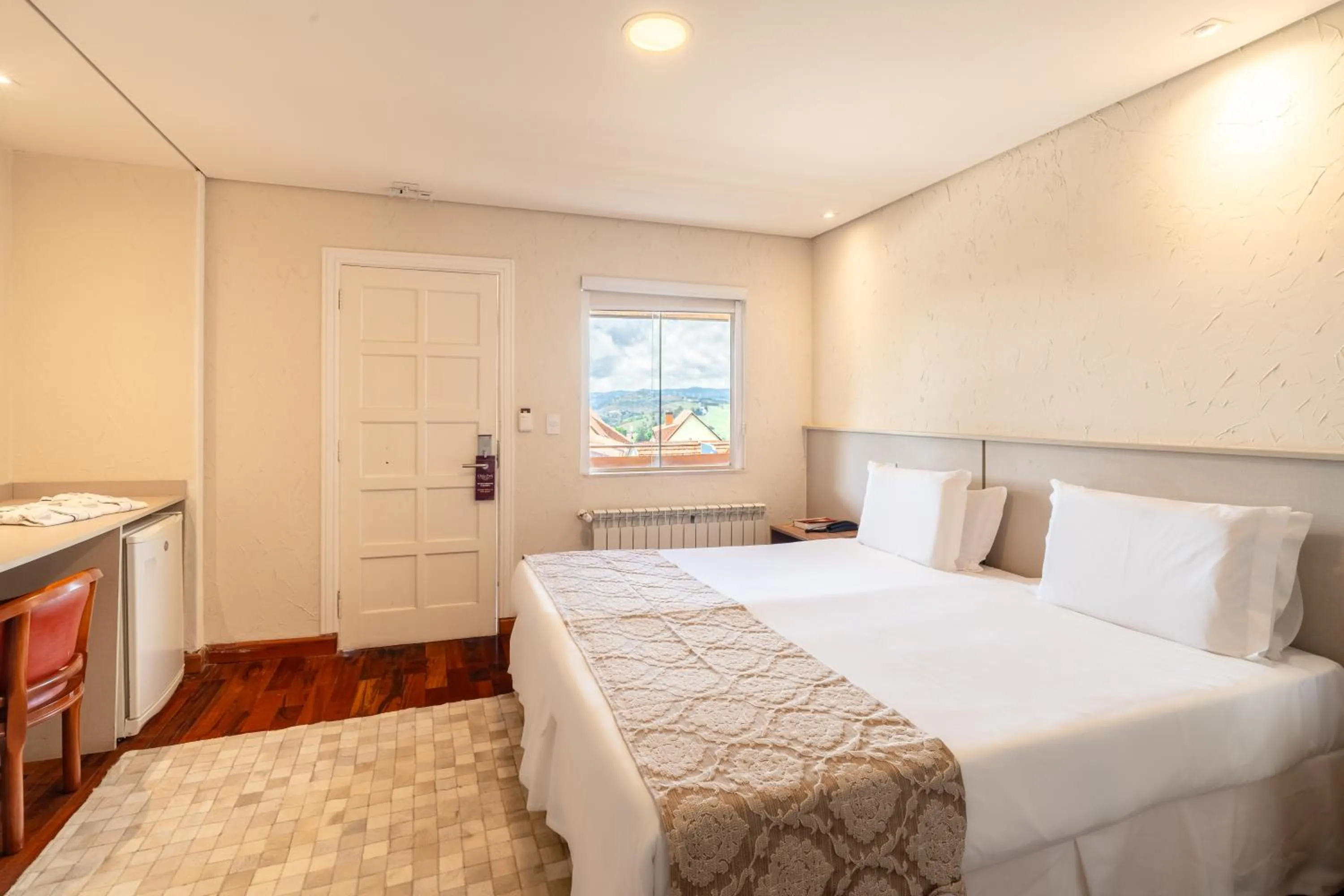 Bed in Chris Wellness Resort Hotel