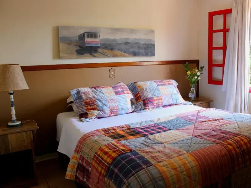 Bed in Pousada Benevento Bed in Pousada Benevento