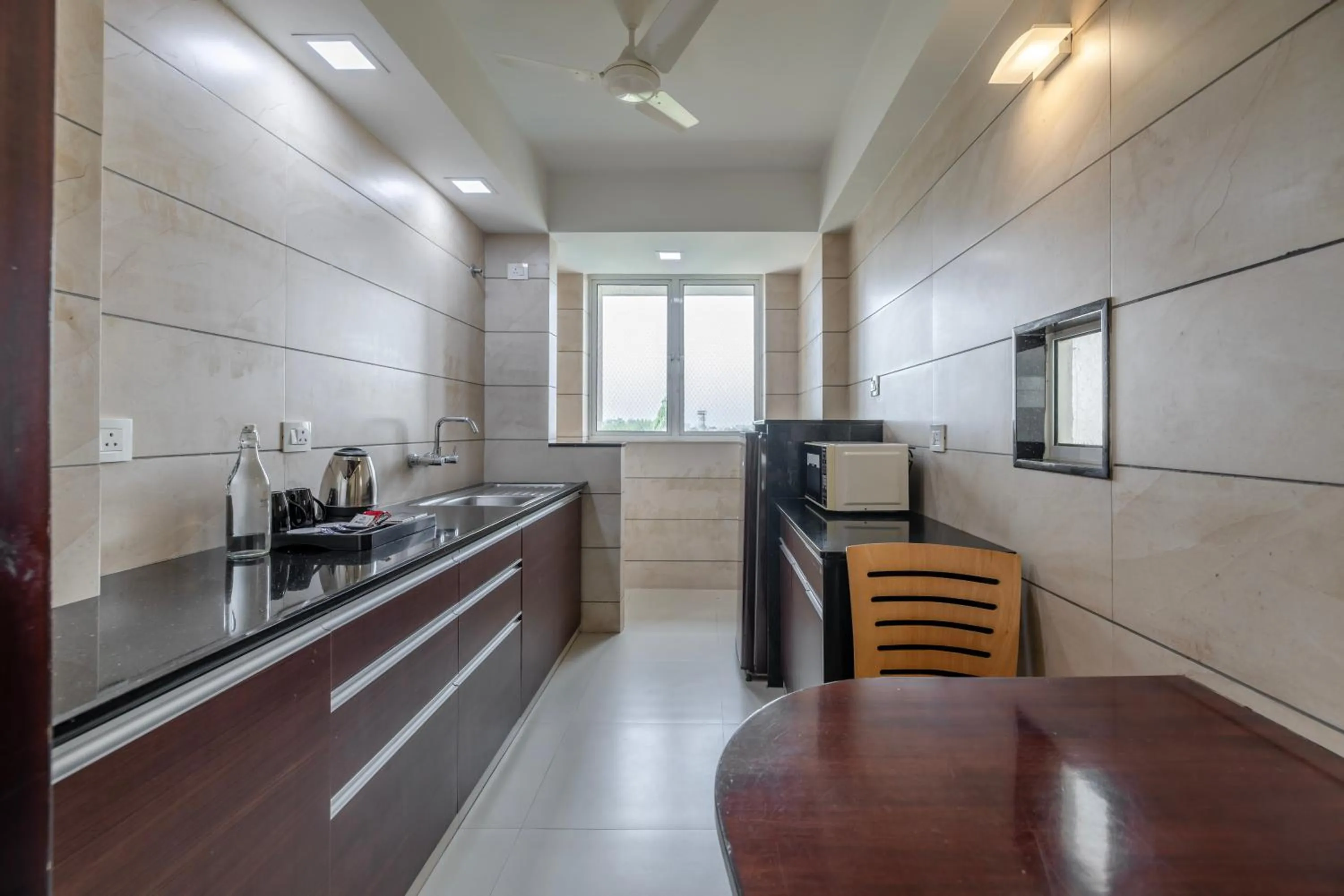 kitchen in Quality Inn Patria Suites, Rajkot