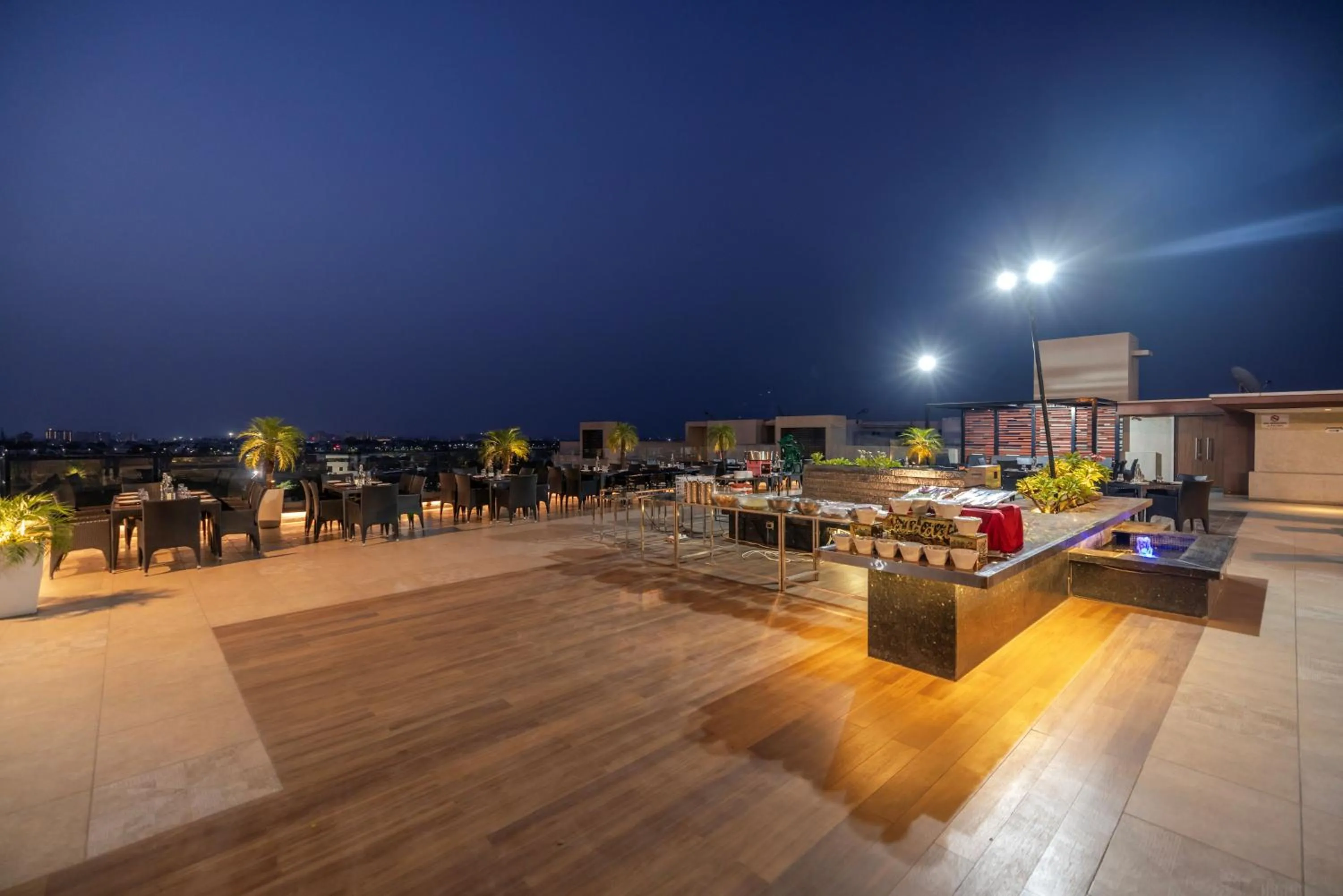 Dining area in Quality Inn Patria Suites, Rajkot