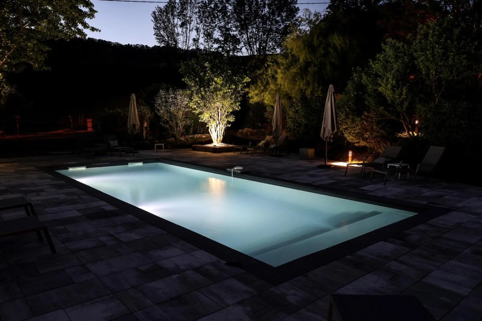 Swimming pool in Maison d'hôtes & SPA La Scierie